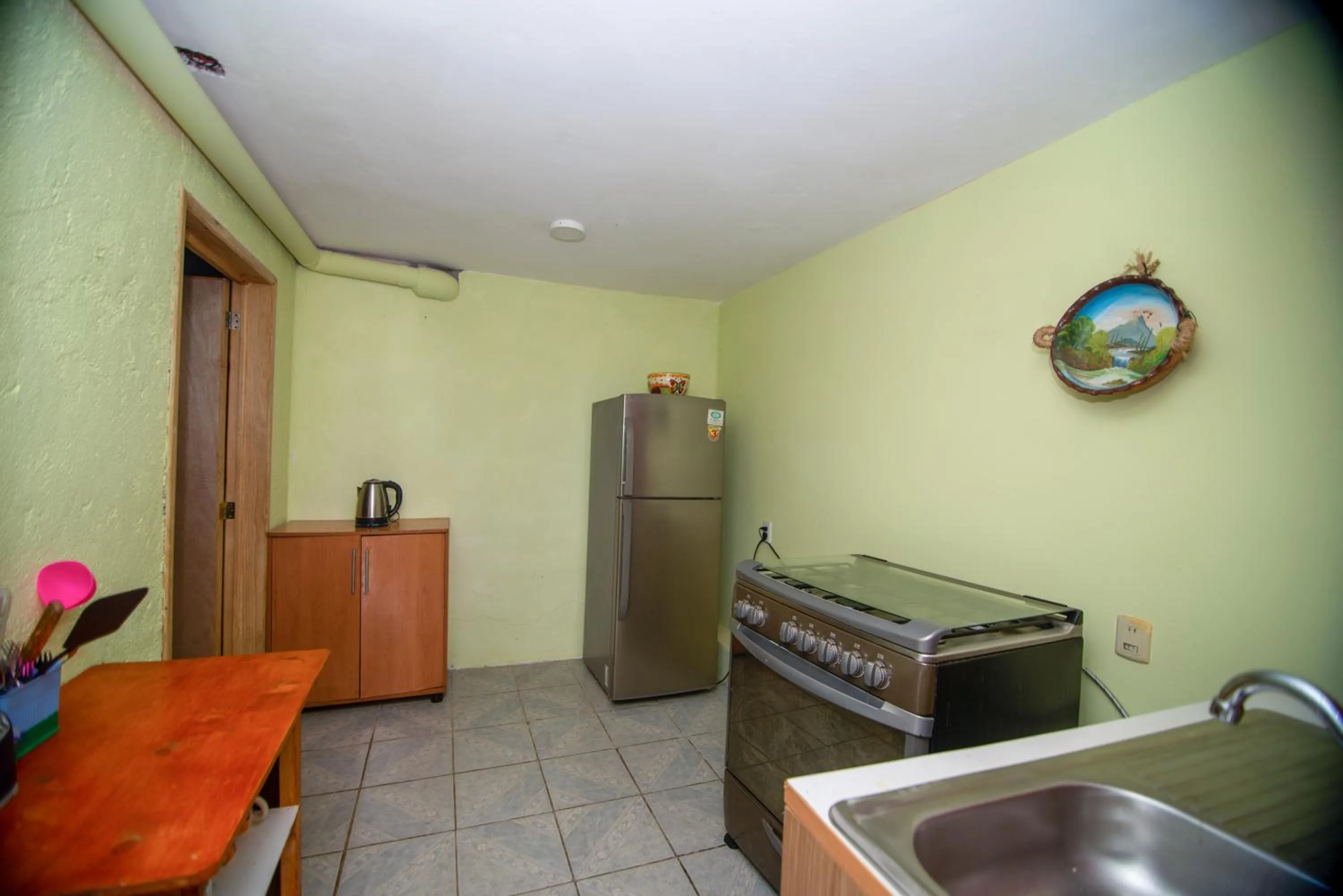 Kitchen or kitchenette in BONITO y AMPLIO DEPARTAMENTO con JARDÍN "EL PARAÍSO DE ZACATLÁN"