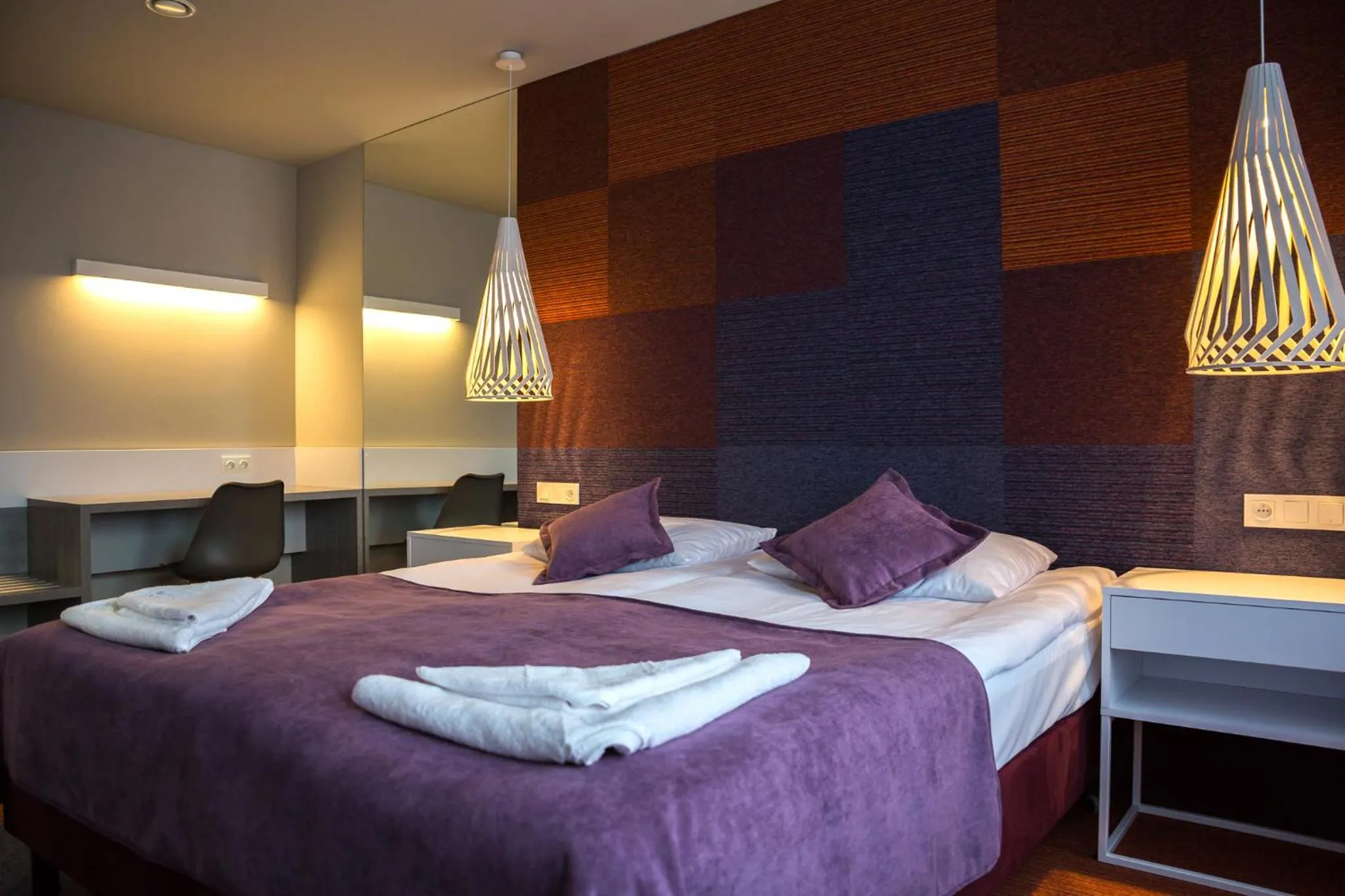 Bed in Hotel Quattro