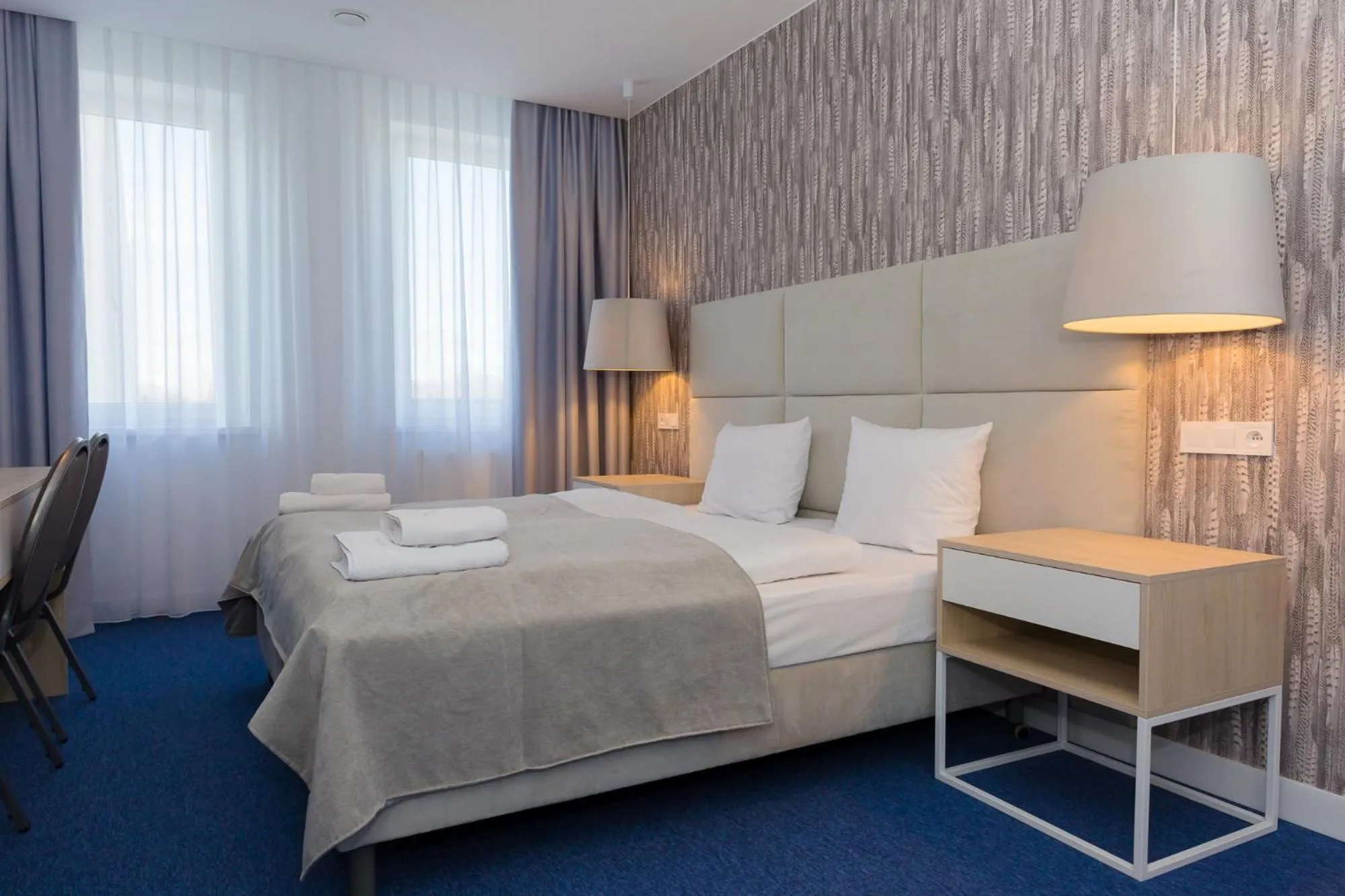 Bed in Hotel Quattro