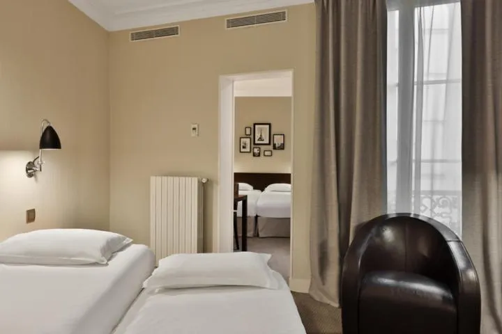 Bed in Hôtel Londres et New York - Teritoria