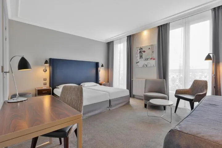 Bed in Hôtel Londres et New York - Teritoria