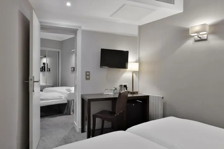 Bed in Hôtel Londres et New York - Teritoria