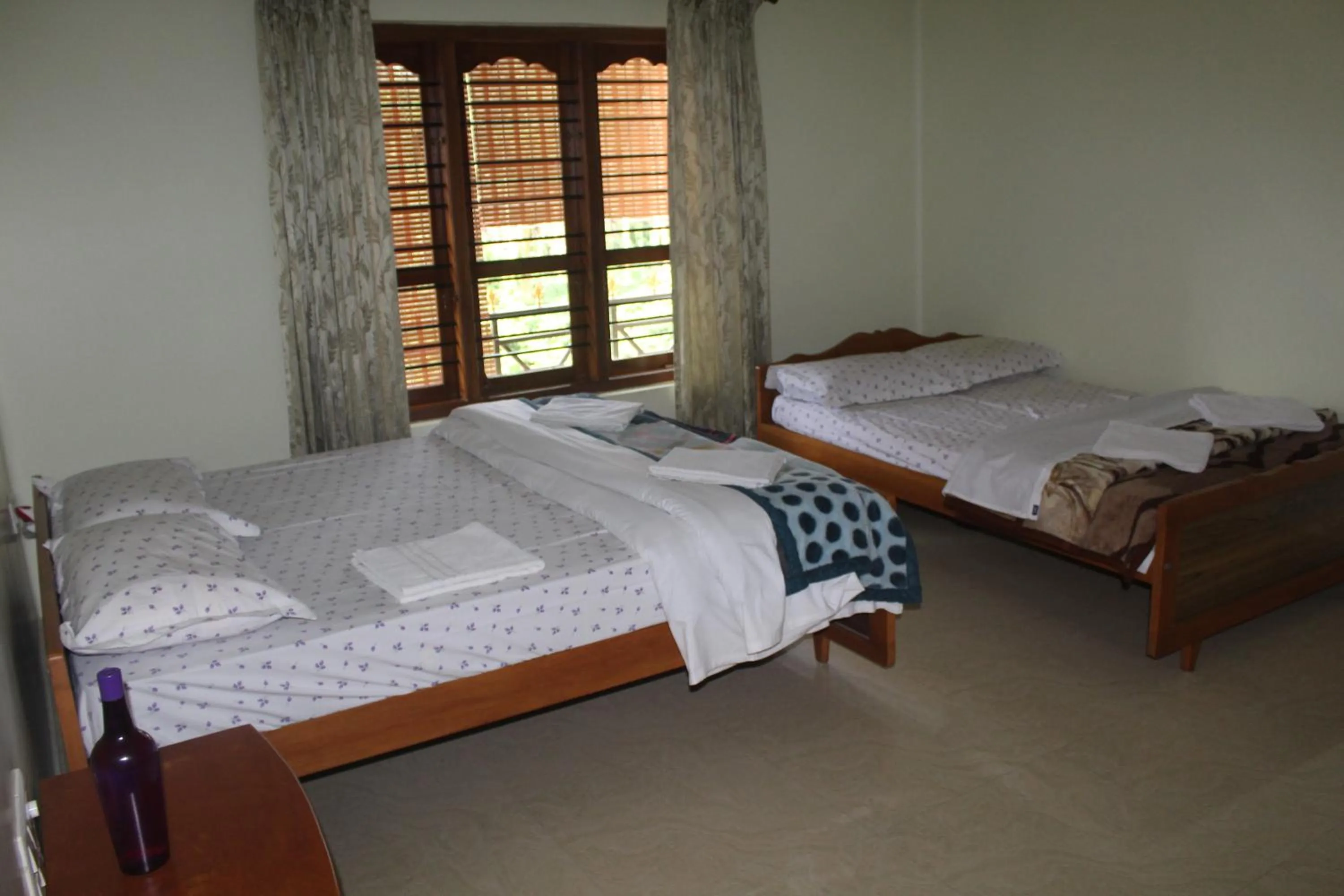 Quadruple Room with Balcony - single occupancy in Whistling Woods Farm Stay