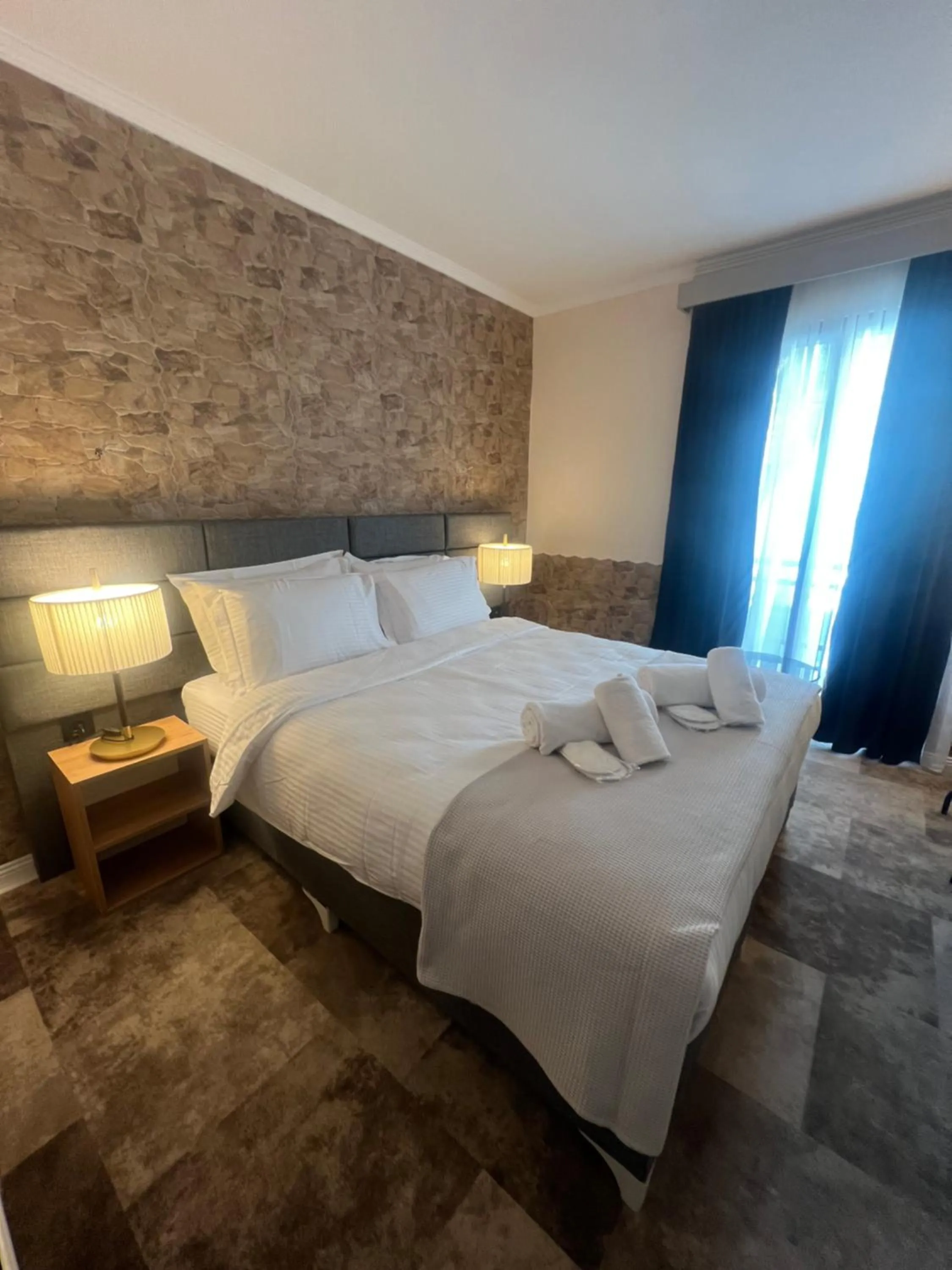 Bedroom, Bed in Lighthouse Hotel