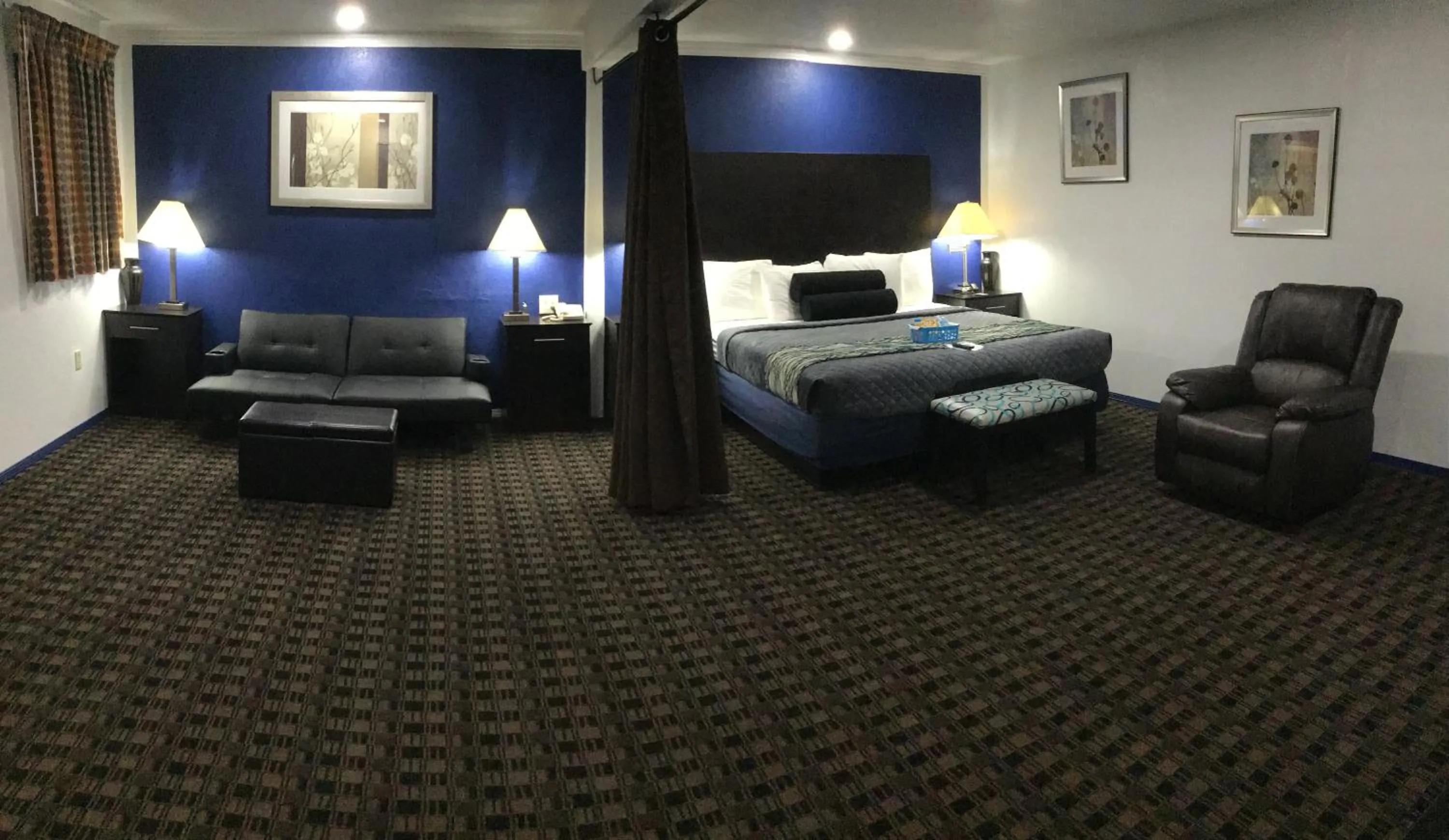 Bed in Budget Inn & Suites
