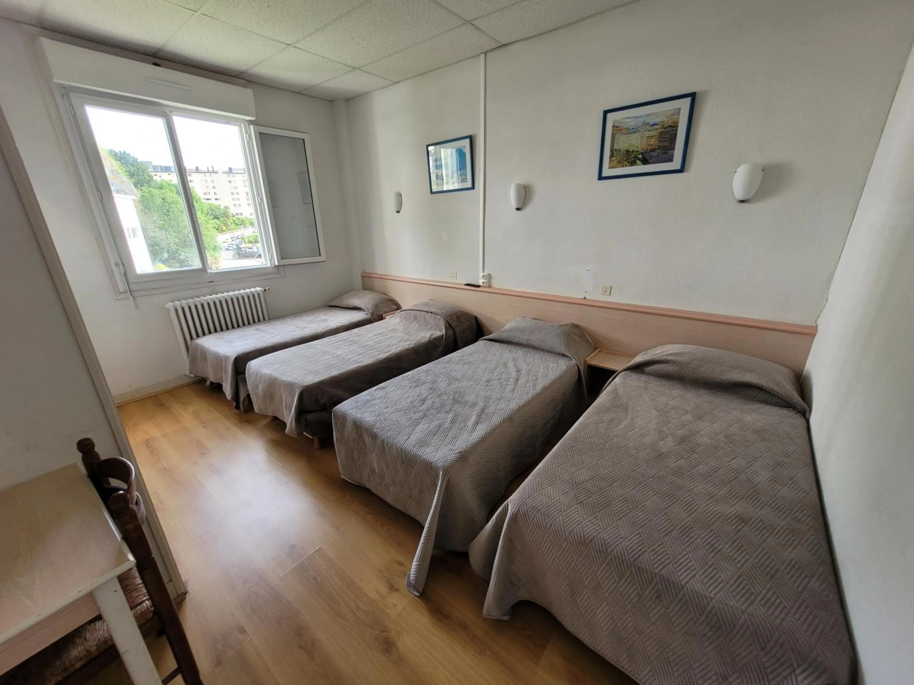 Bedroom in Hôtel Marquette