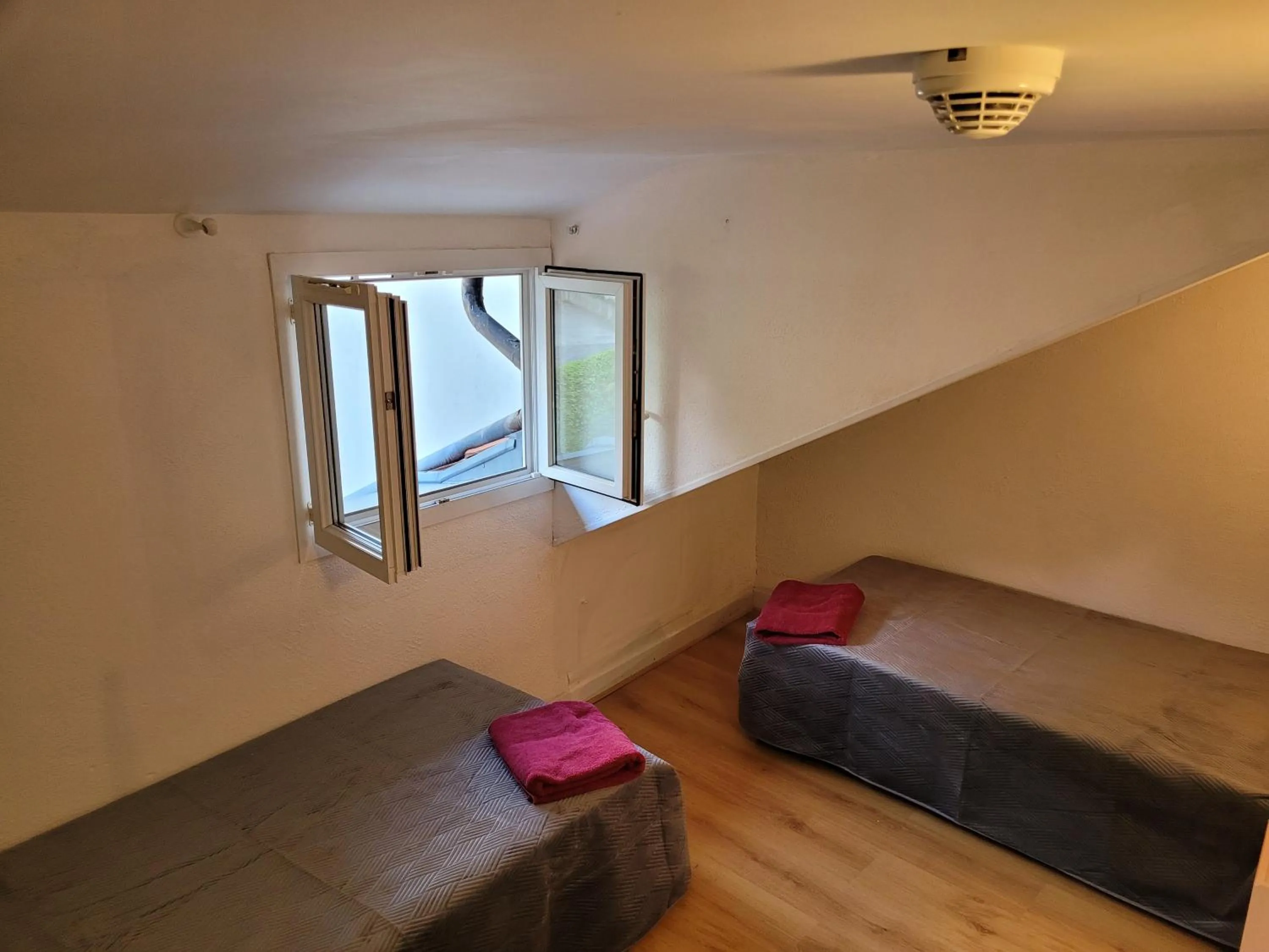 Bedroom in Hôtel Marquette