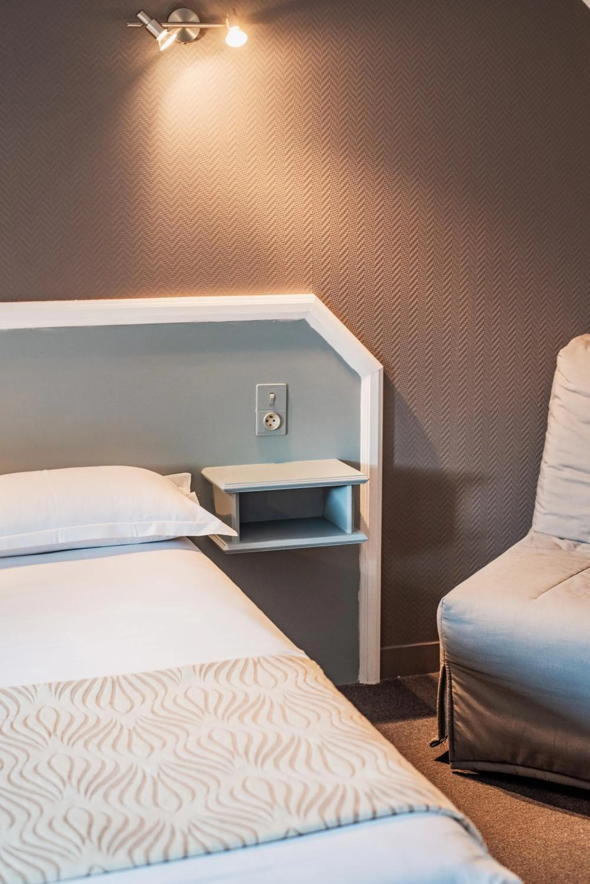 Bed in Hôtel La Tour des Anglais