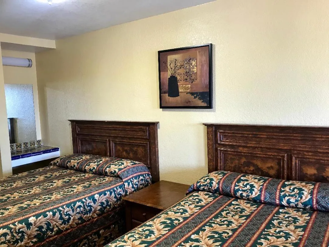Bed in Hacienda Motel