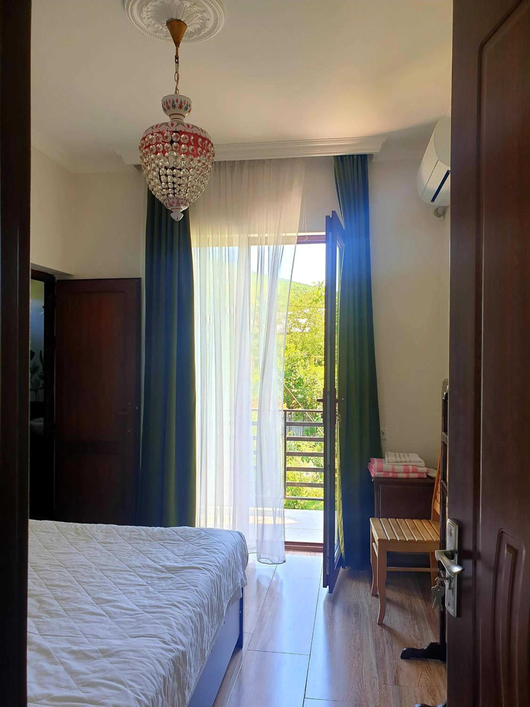 Photo of the whole room, Bed in Four Seasons in Kutaisi