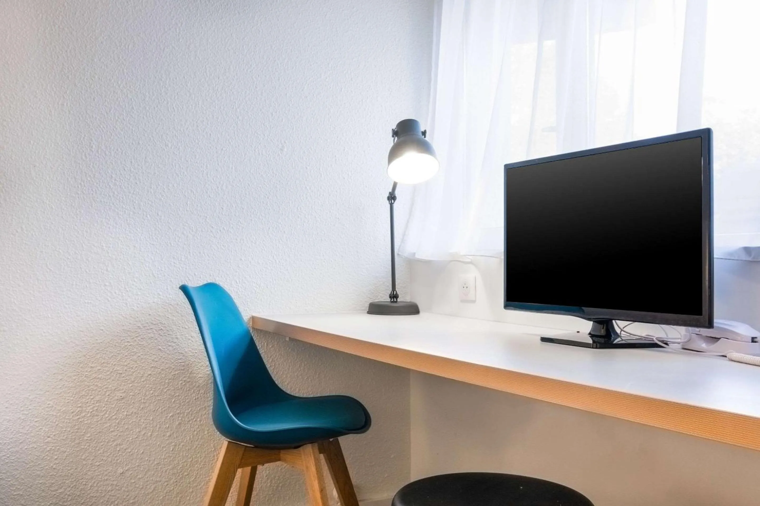 Photo of the whole room in Comfort Hôtel RUNGIS-ORLY