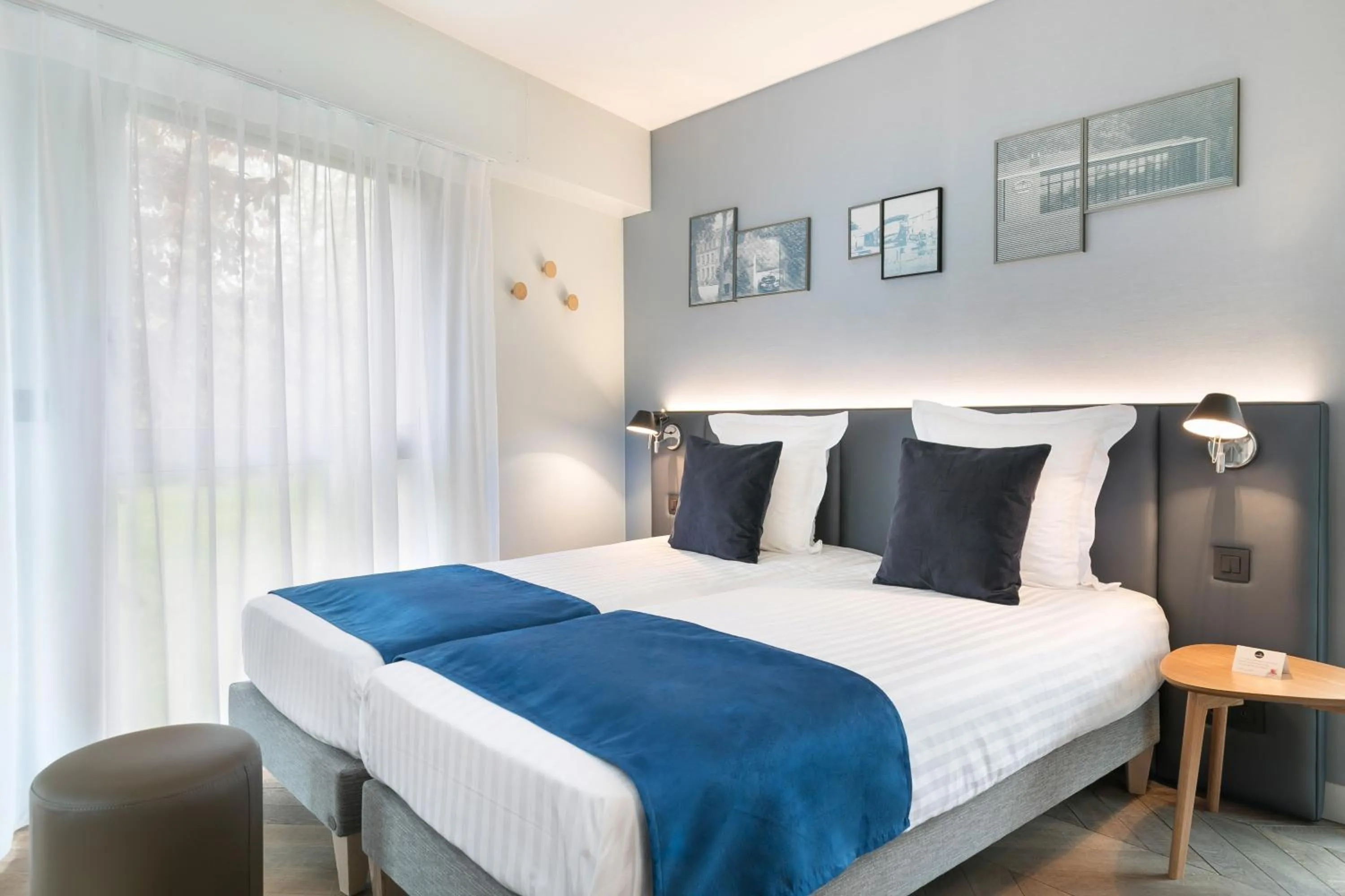 Bed in Hôtel Diana Restaurant & Spa by HappyCulture