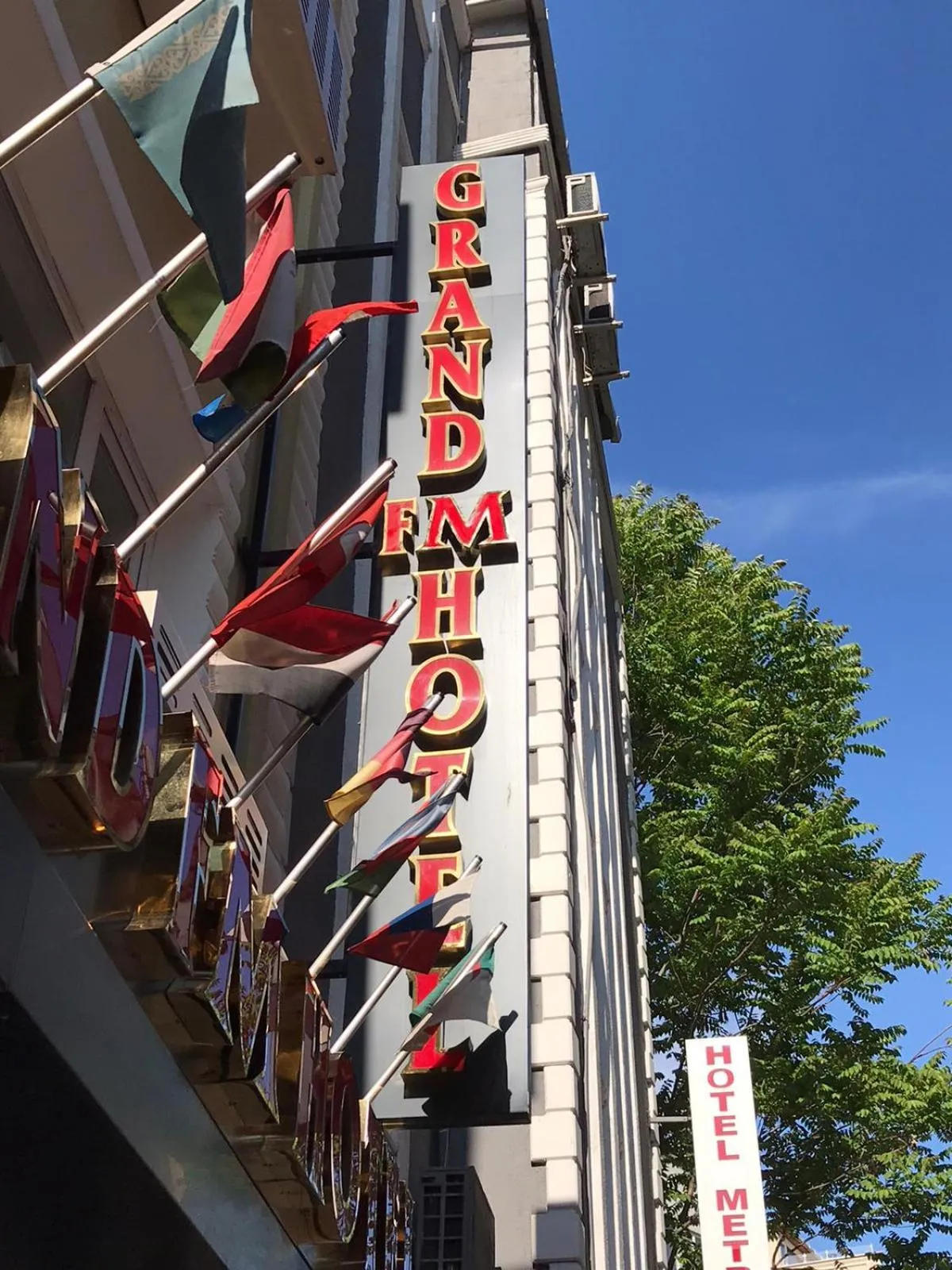 Property logo or sign in Grand FM Hotel