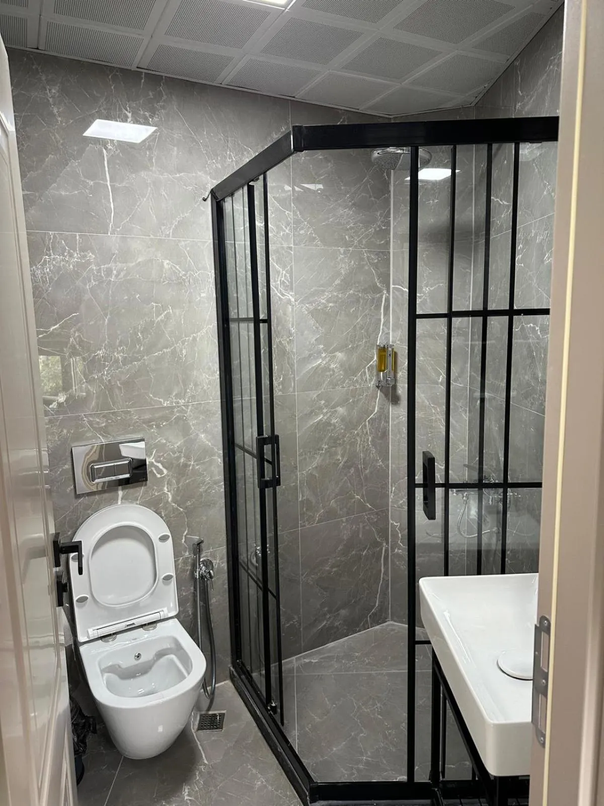 Shower in Grand FM Hotel