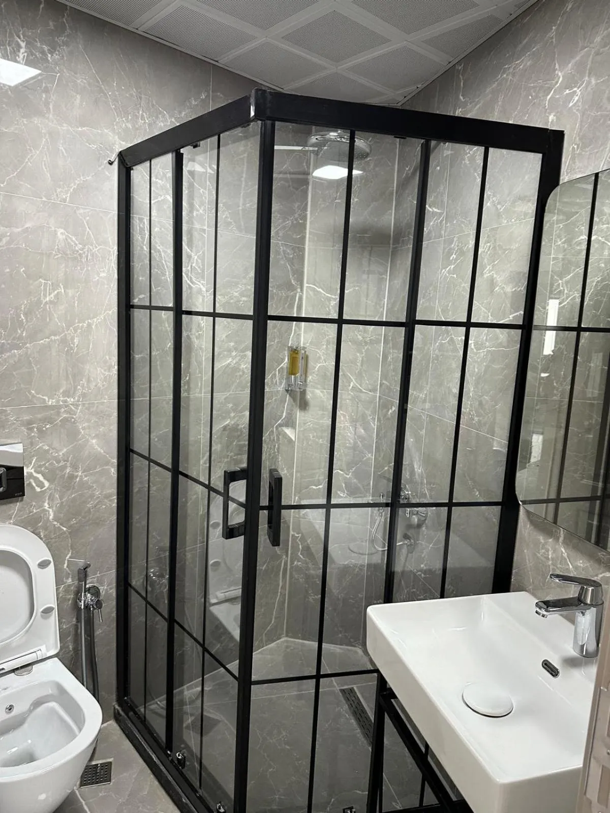 Shower in Grand FM Hotel