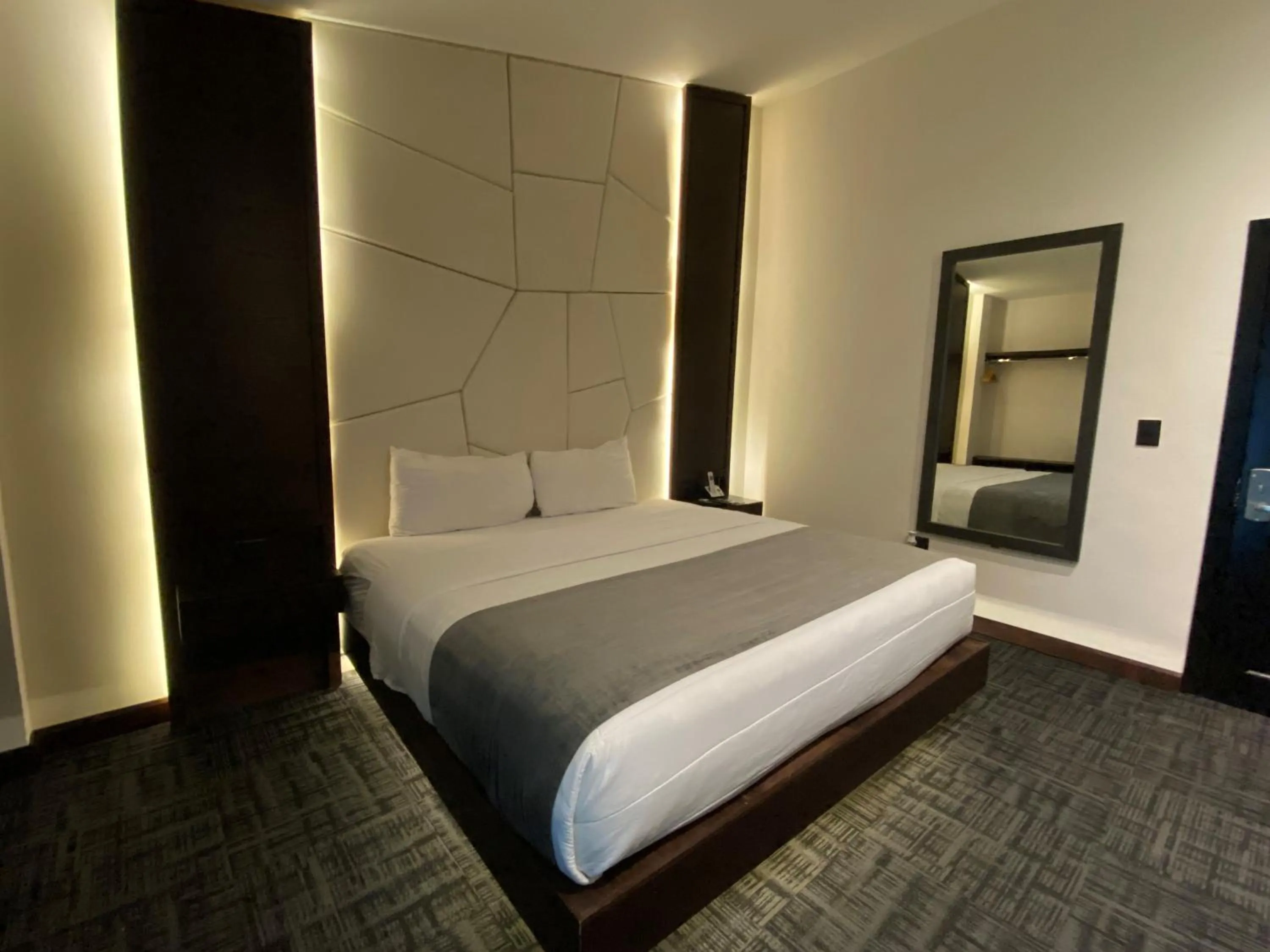 Bed in Stay Inn Hotels