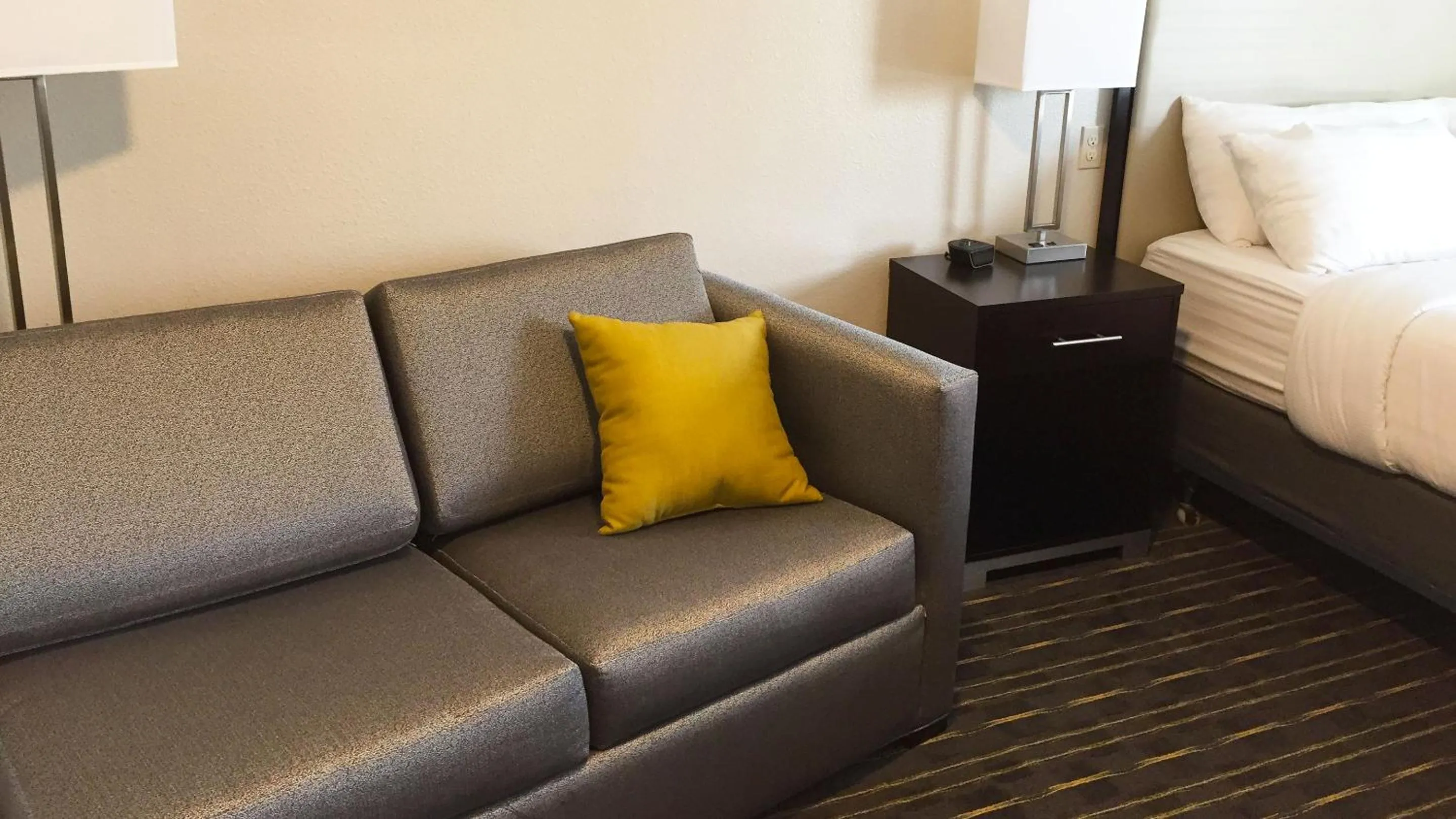 Seating area, Bed in Comfort Inn & Suites Tigard near Washington Square