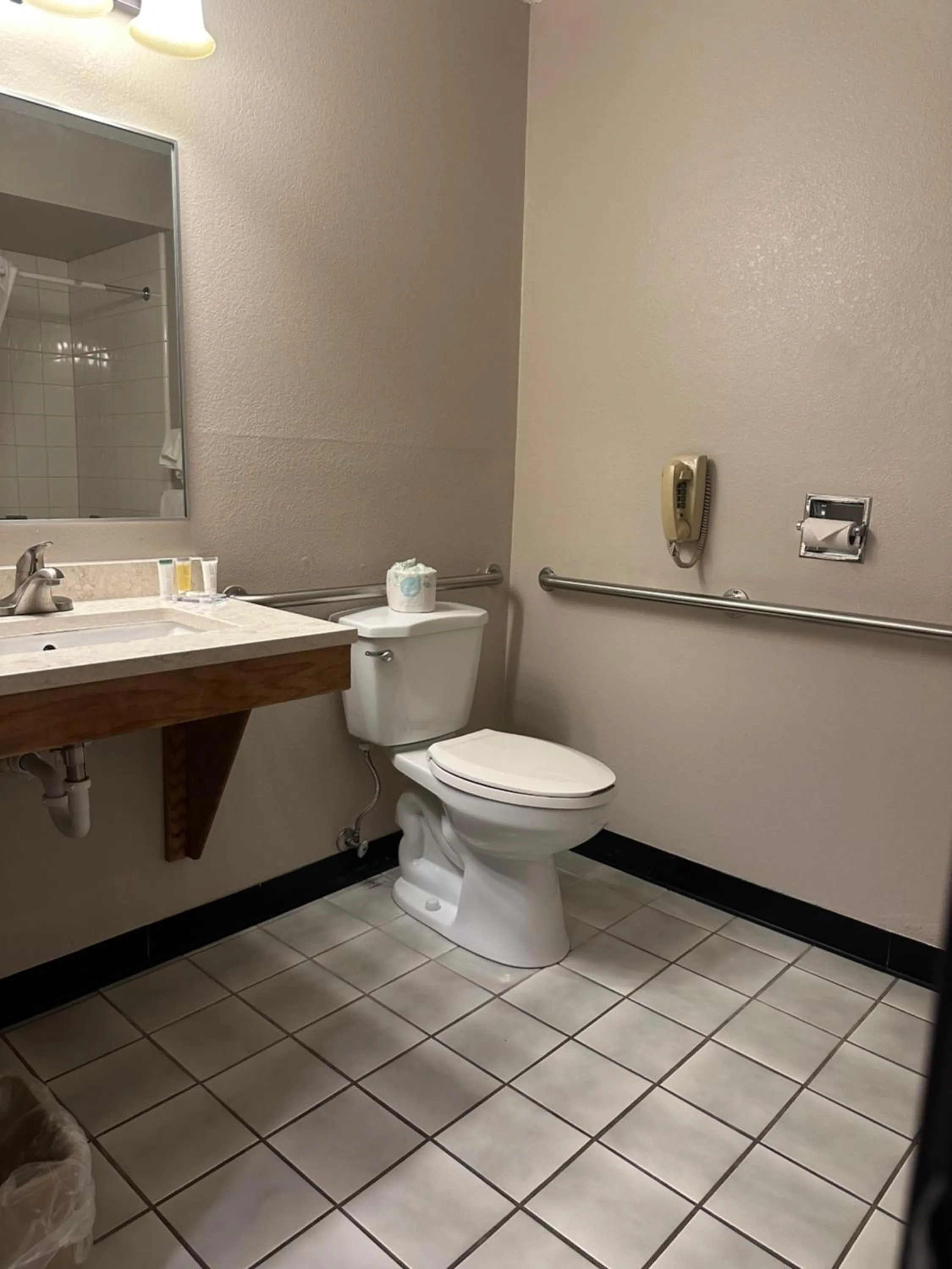 Toilet in Super 8 by Wyndham West Branch