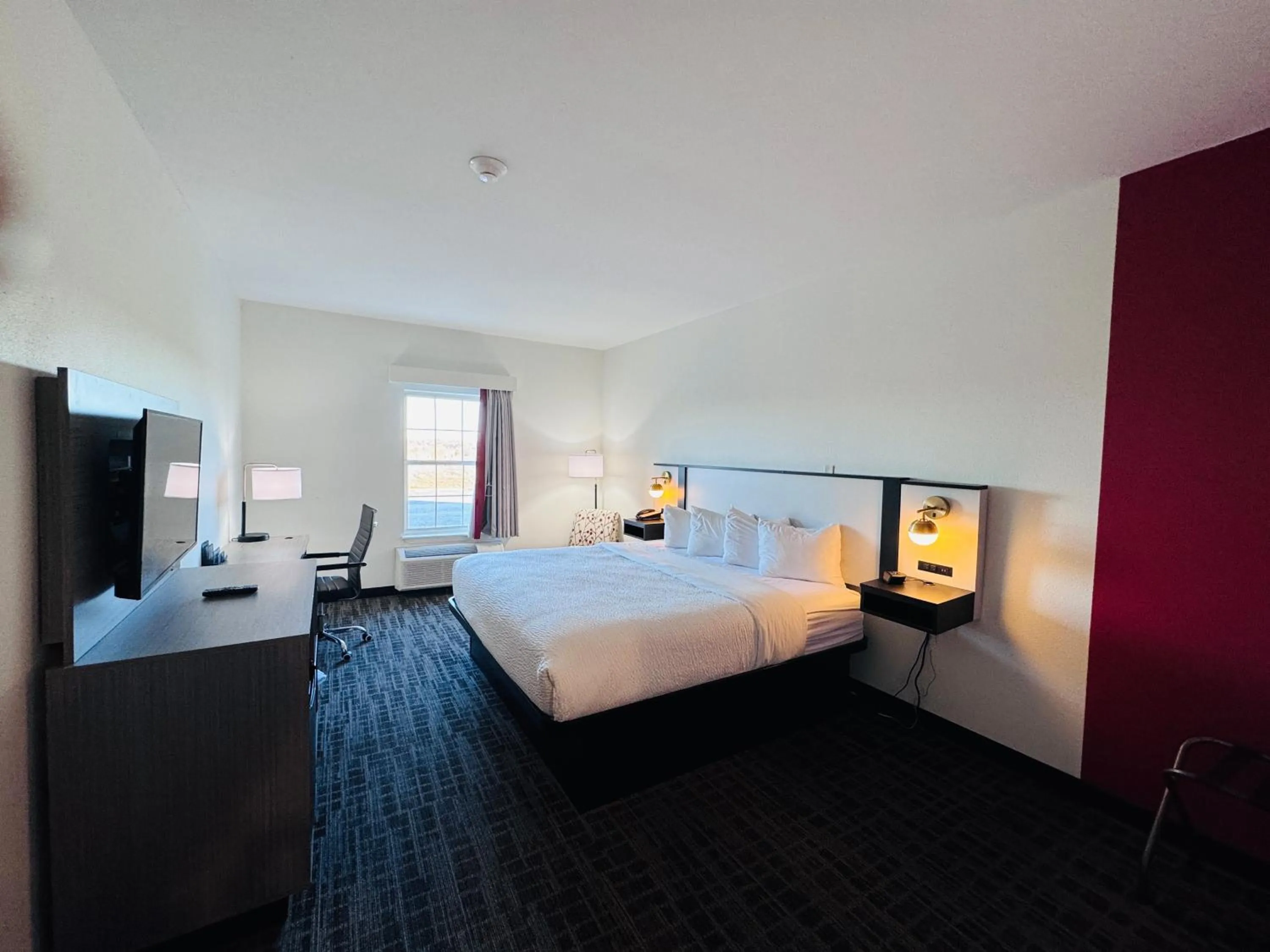 Bed in Ramada by Wyndham Sparta/At Speedway