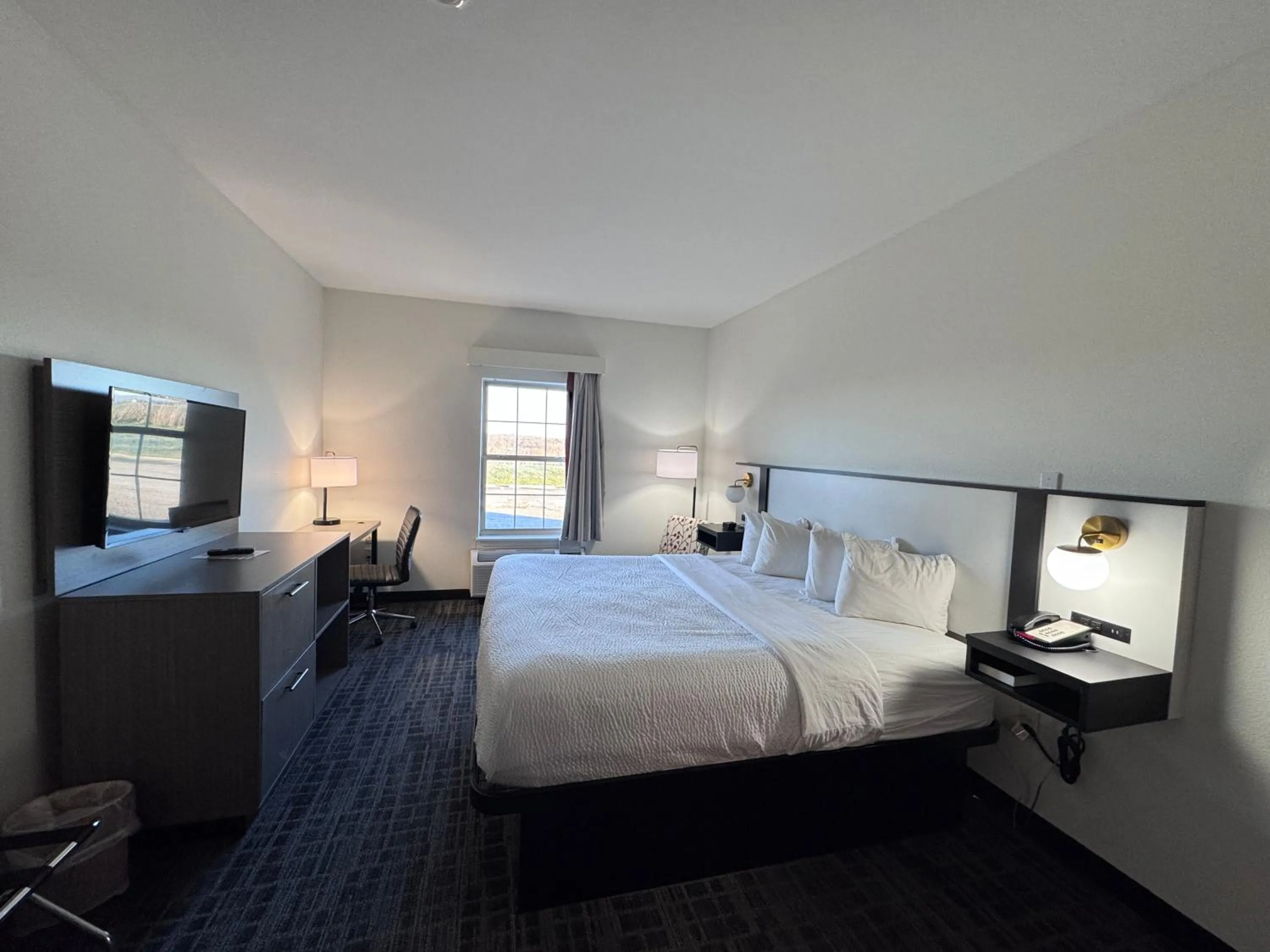 Bed in Ramada by Wyndham Sparta/At Speedway