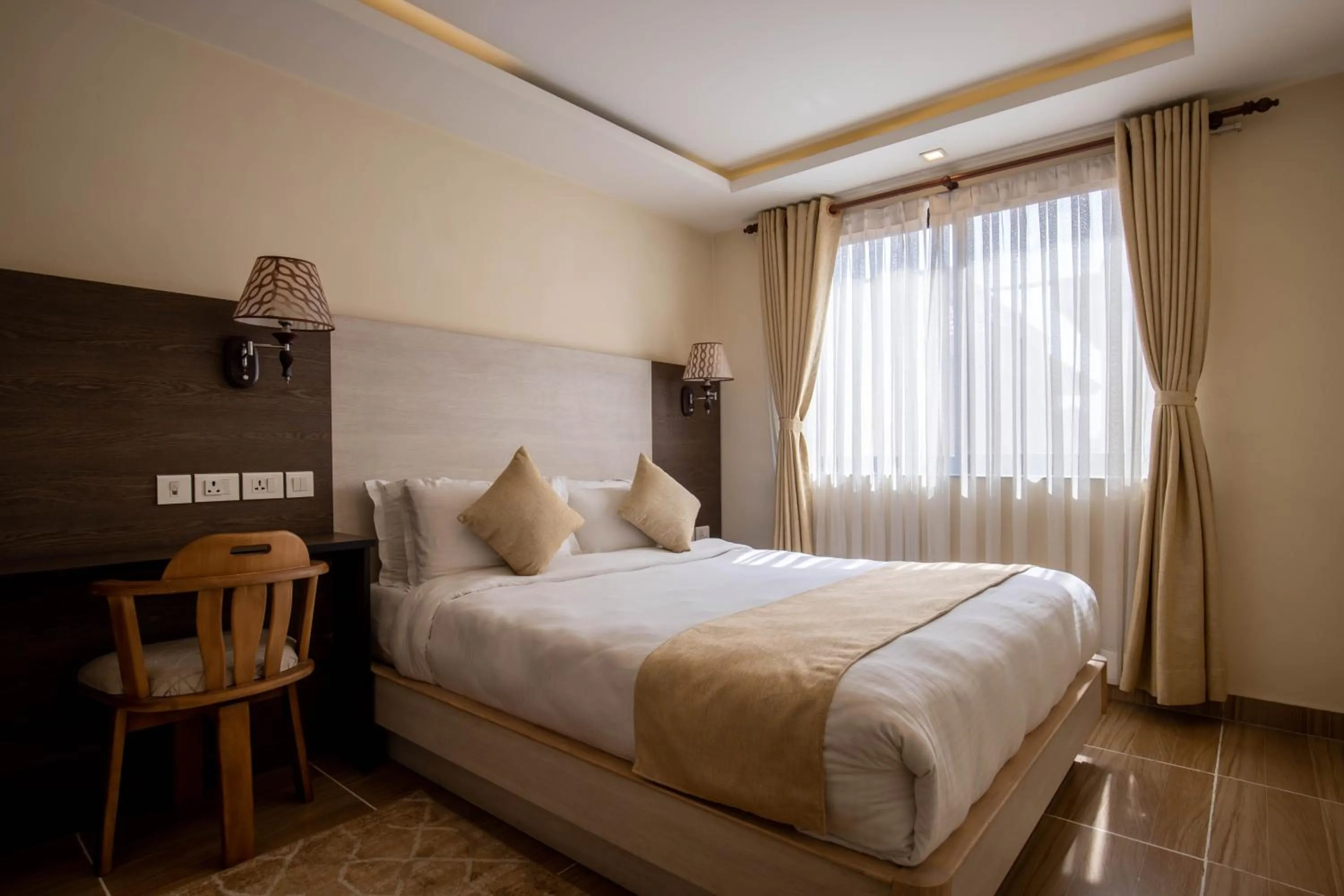 Bed in Sarovar Residency Serviced Apartment Hotel