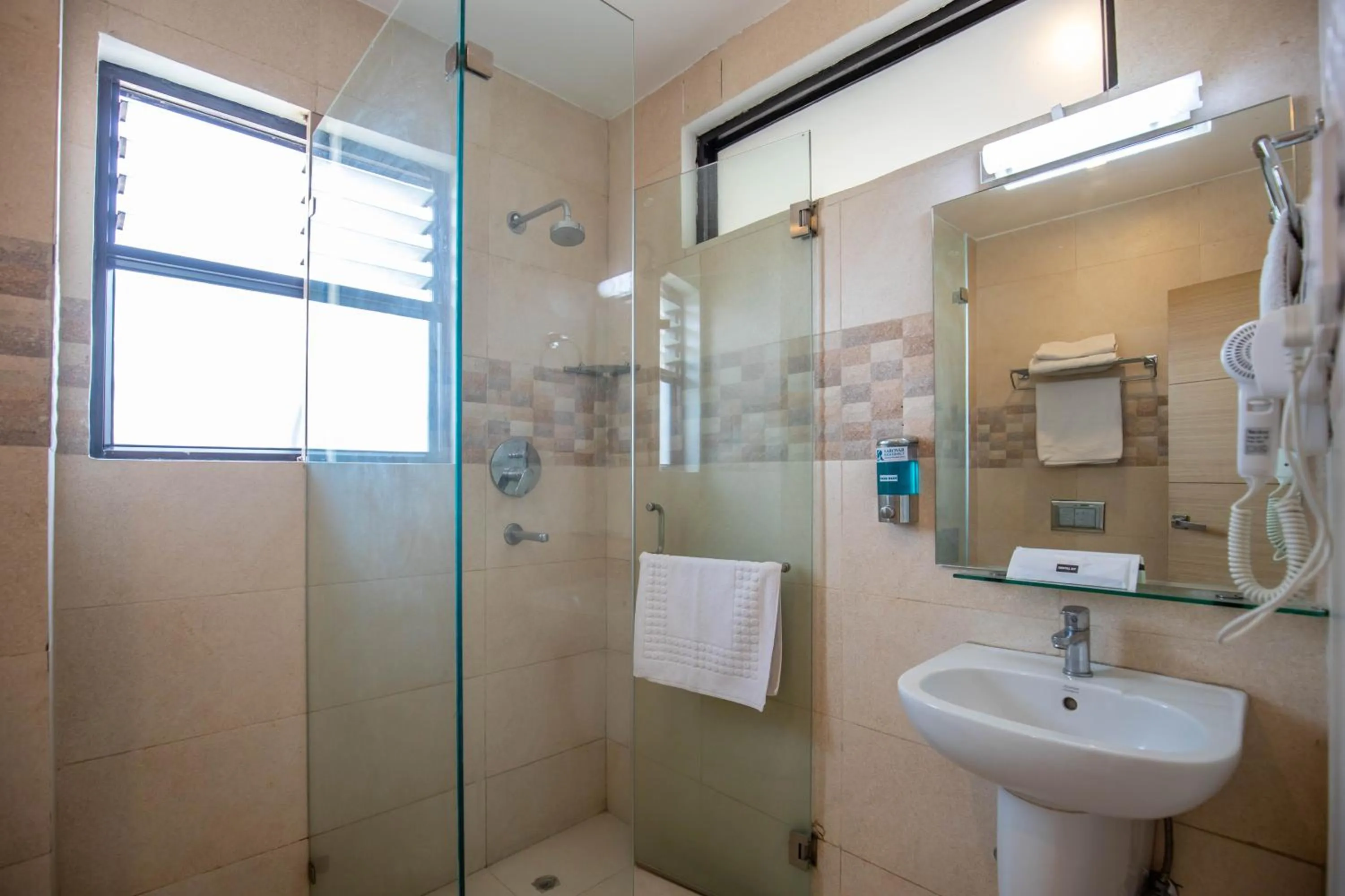 Toilet in Sarovar Residency Serviced Apartment Hotel