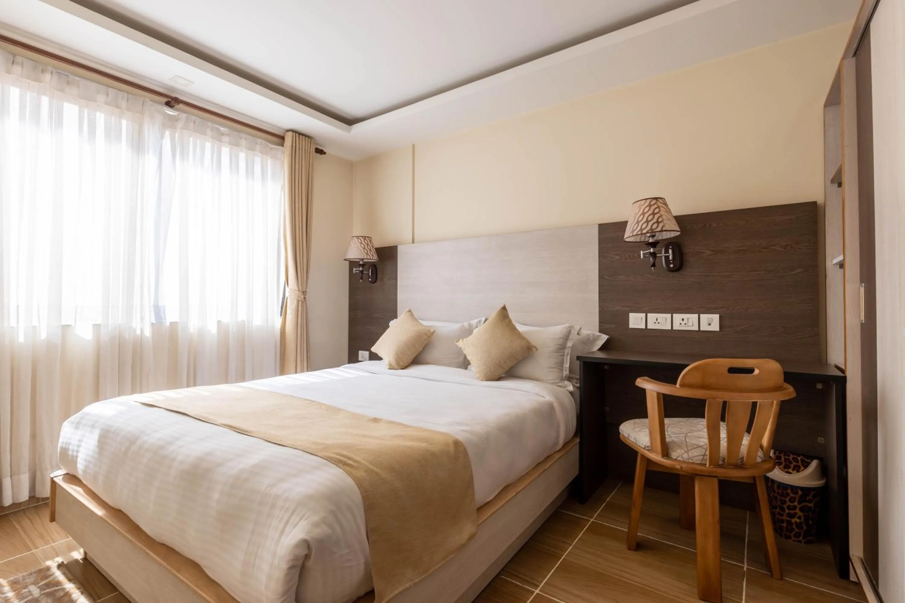 Bed in Sarovar Residency Serviced Apartment Hotel