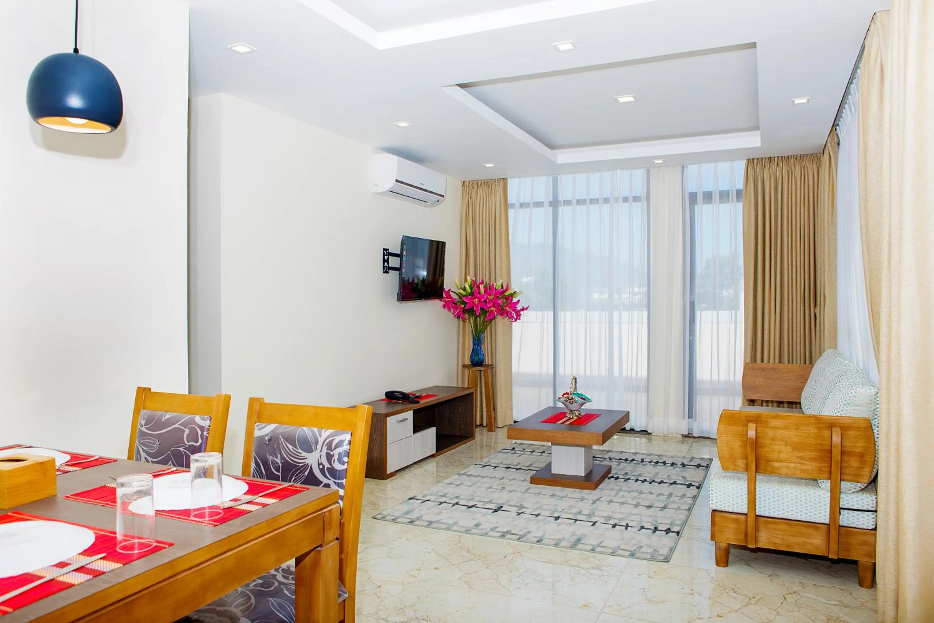 TV and multimedia in Sarovar Residency Serviced Apartment Hotel