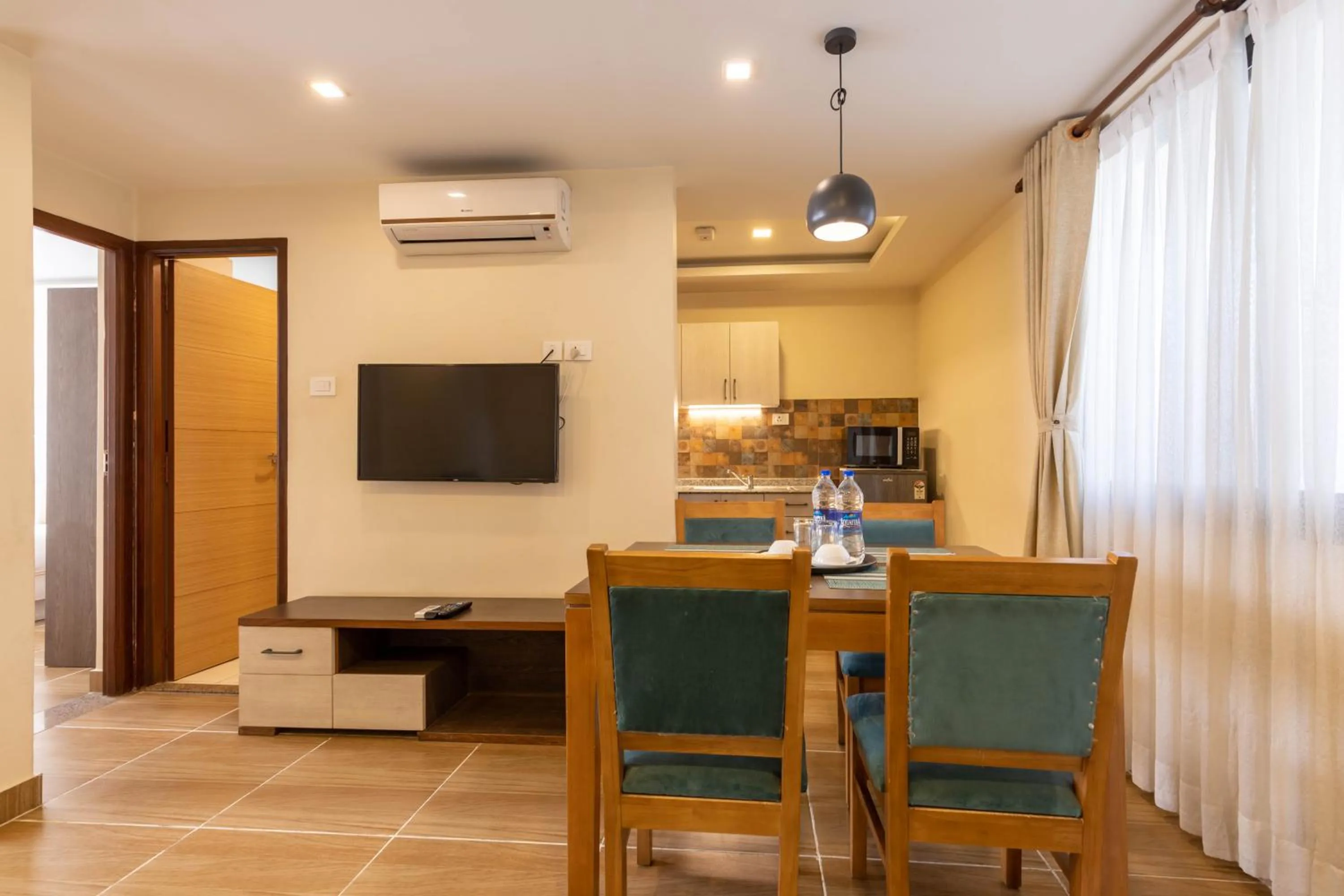 Kitchen or kitchenette in Sarovar Residency Serviced Apartment Hotel