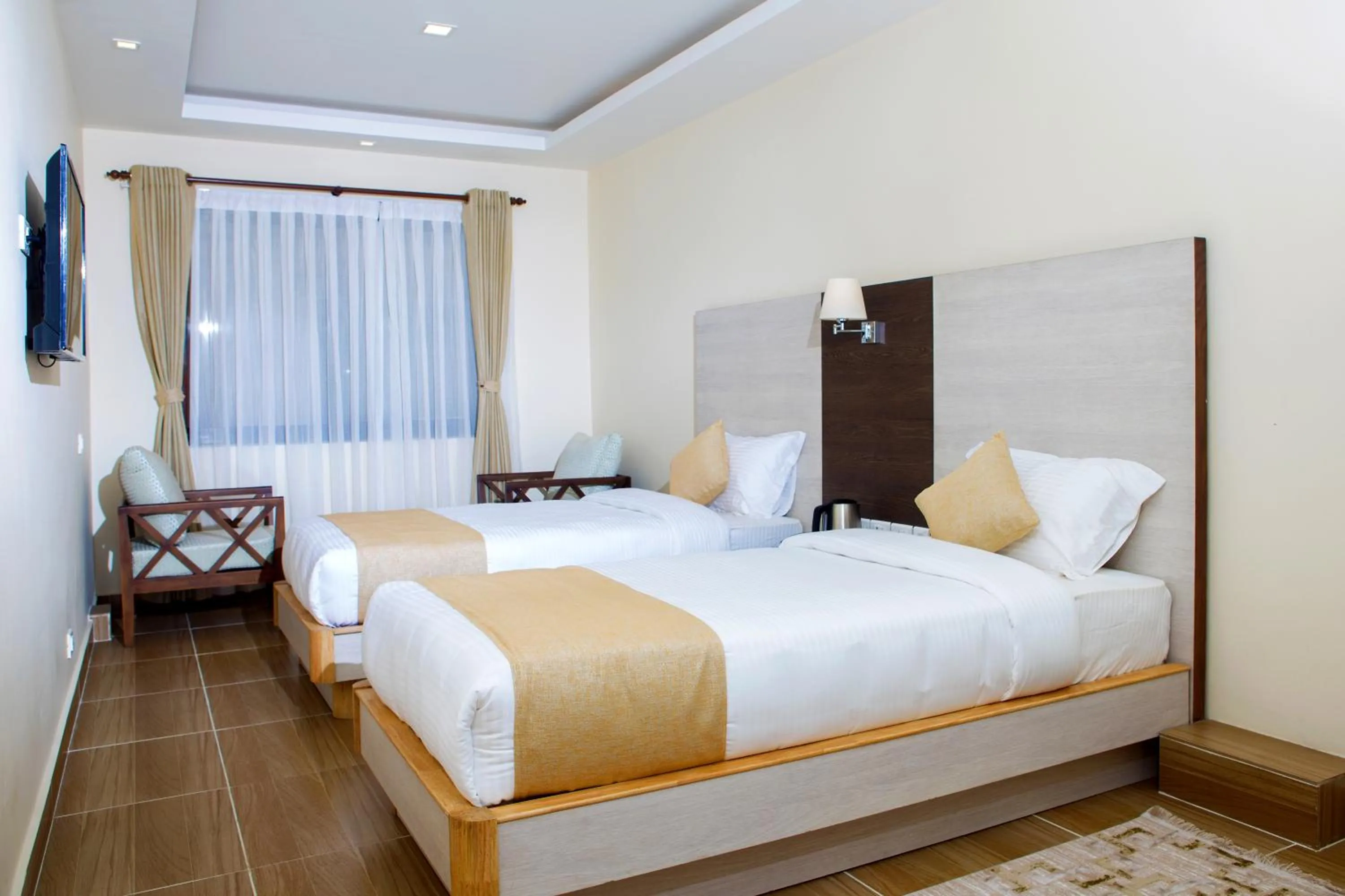 Bed in Sarovar Residency Serviced Apartment Hotel