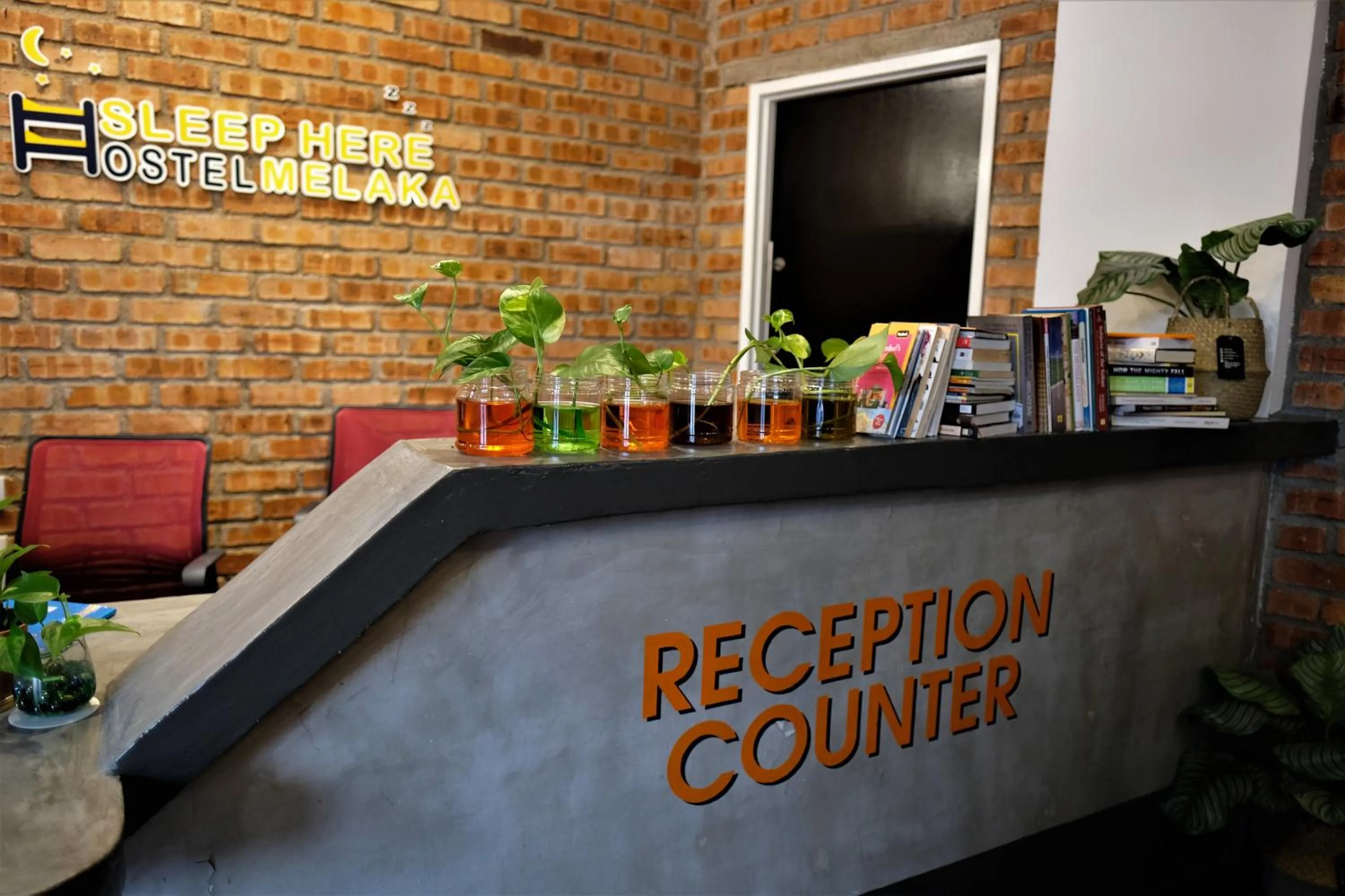 Property logo or sign in Sleep Here Hostel, Melaka