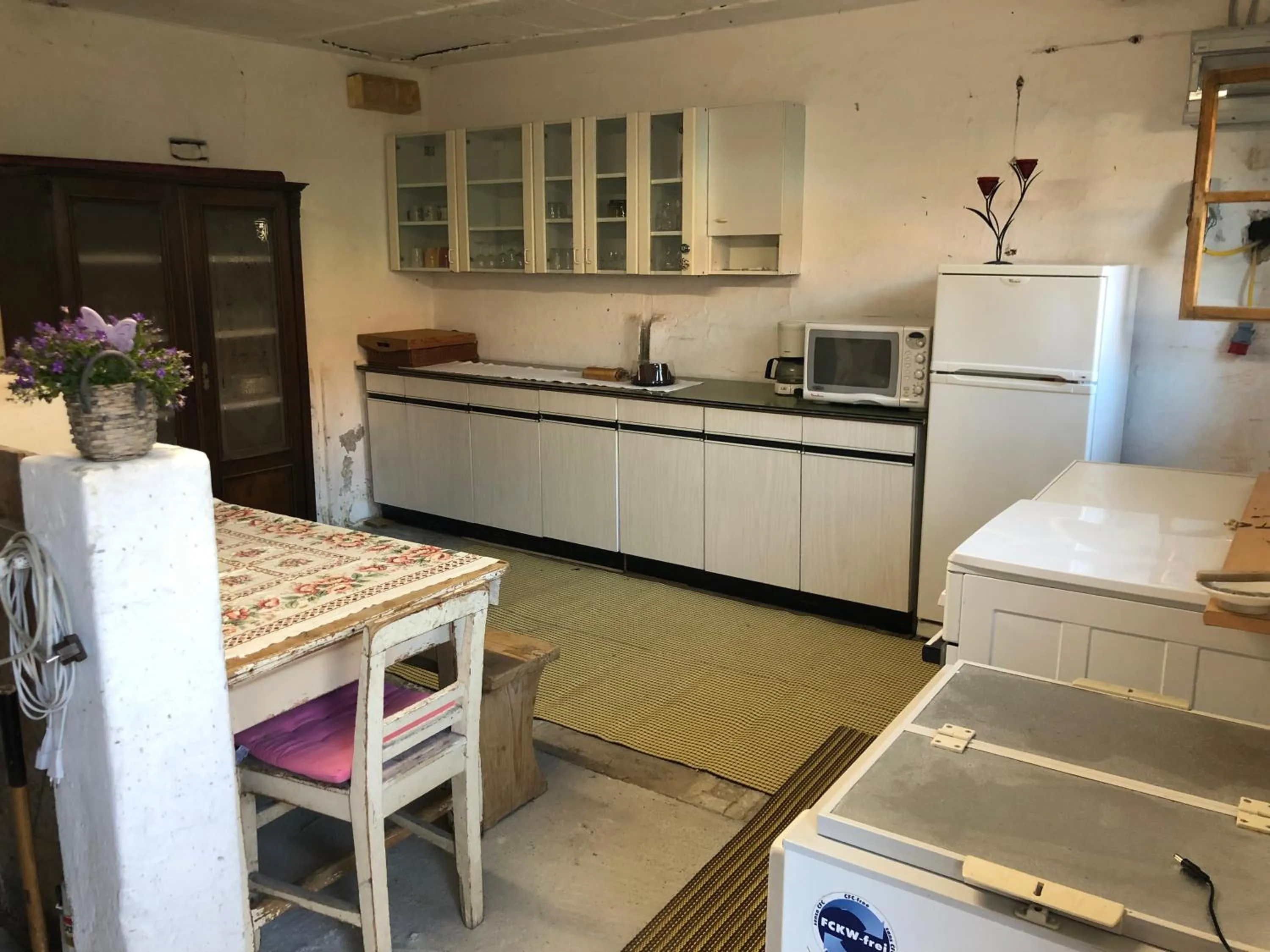 Kitchen or kitchenette in Auszeit; Gästehaus & mehr