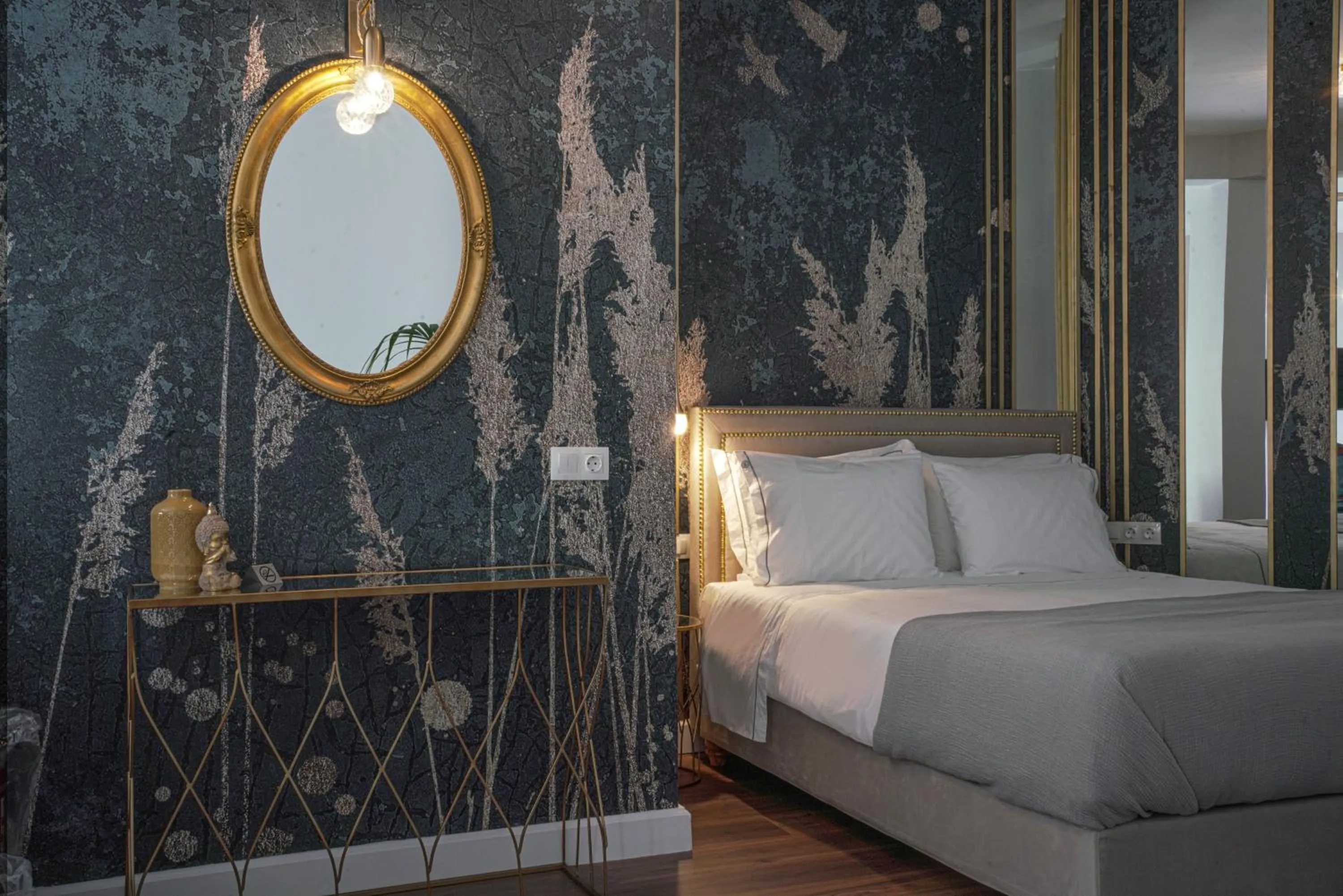 Bed in Pafsilipon Suites