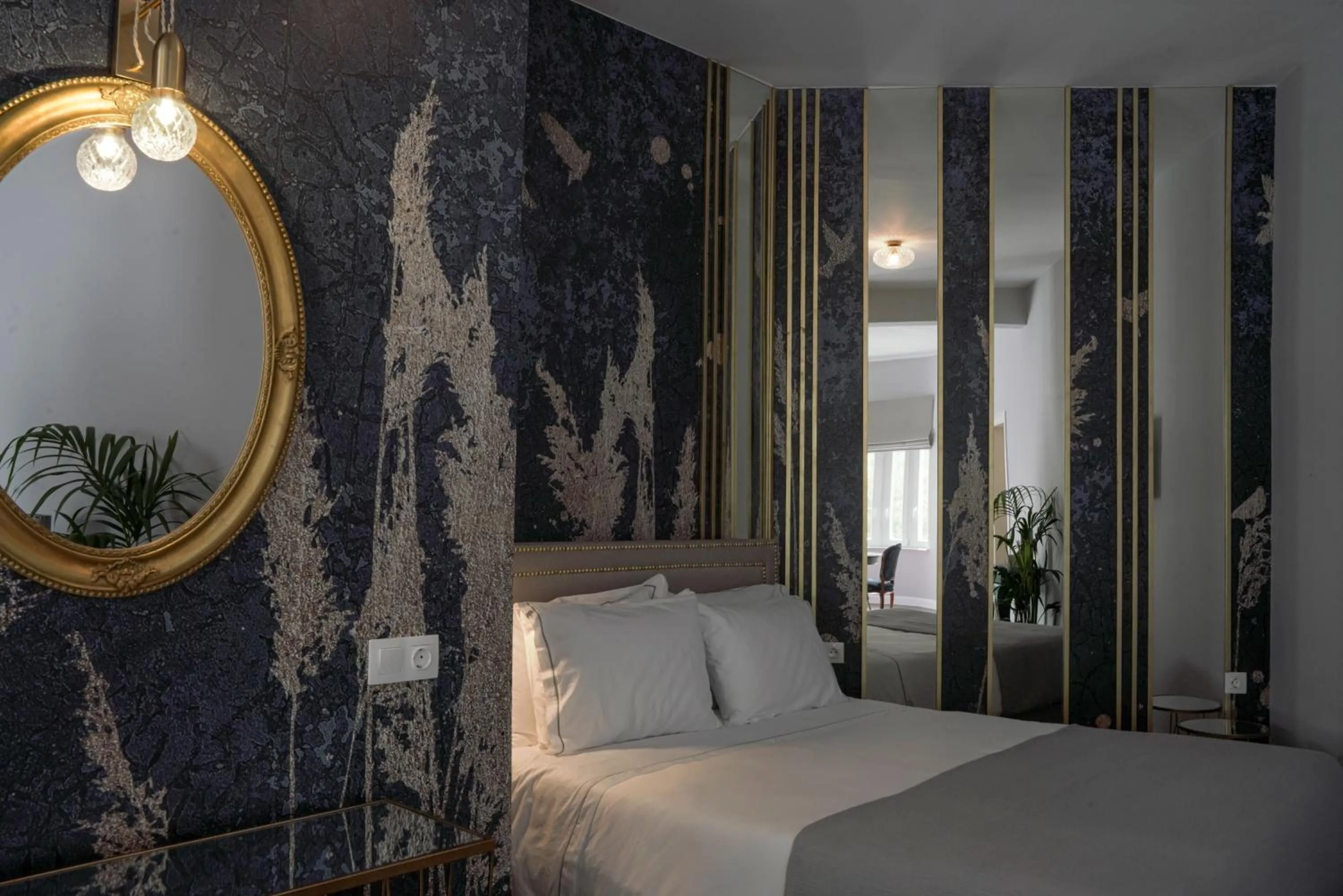 Bed in Pafsilipon Suites