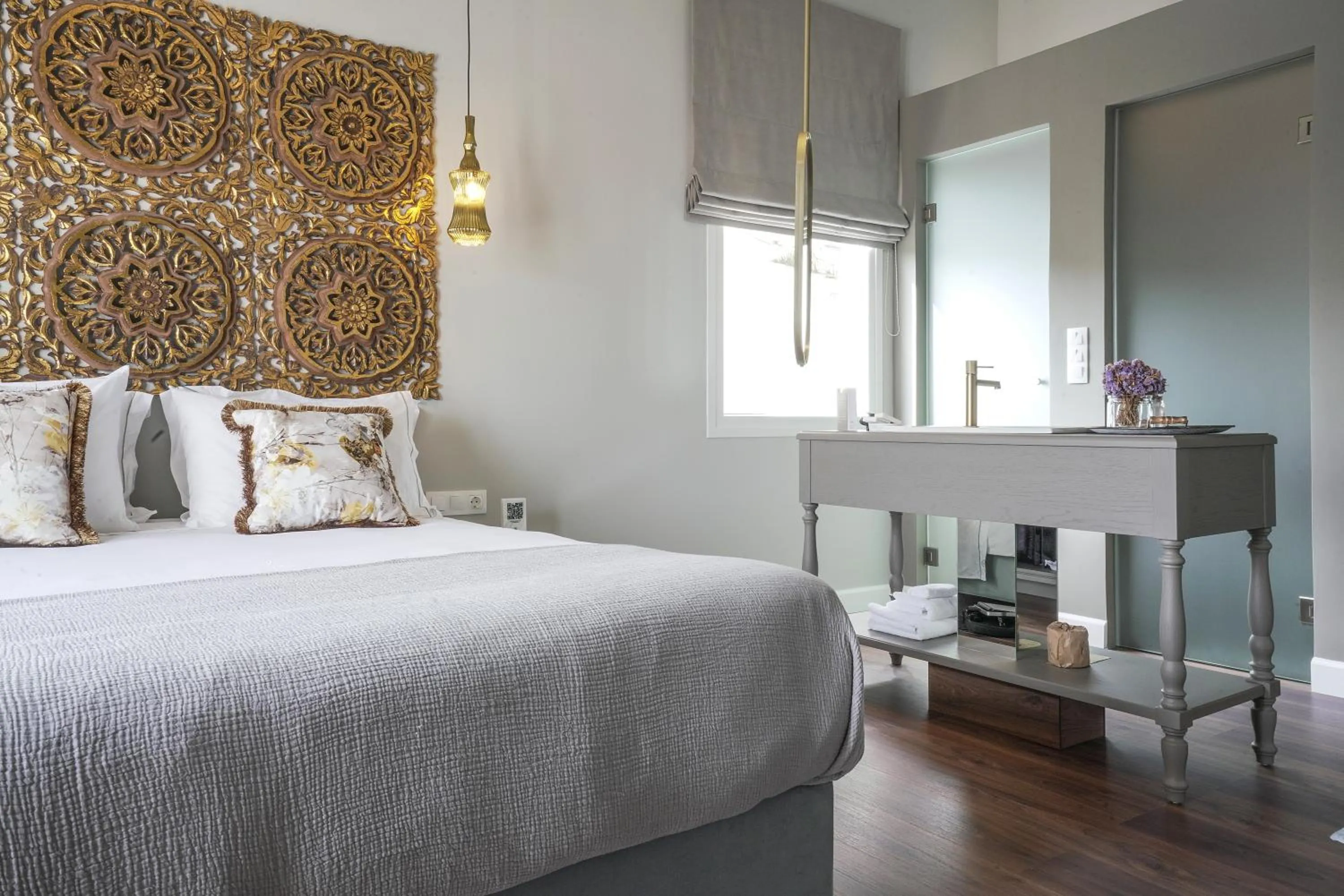 Bed in Pafsilipon Suites