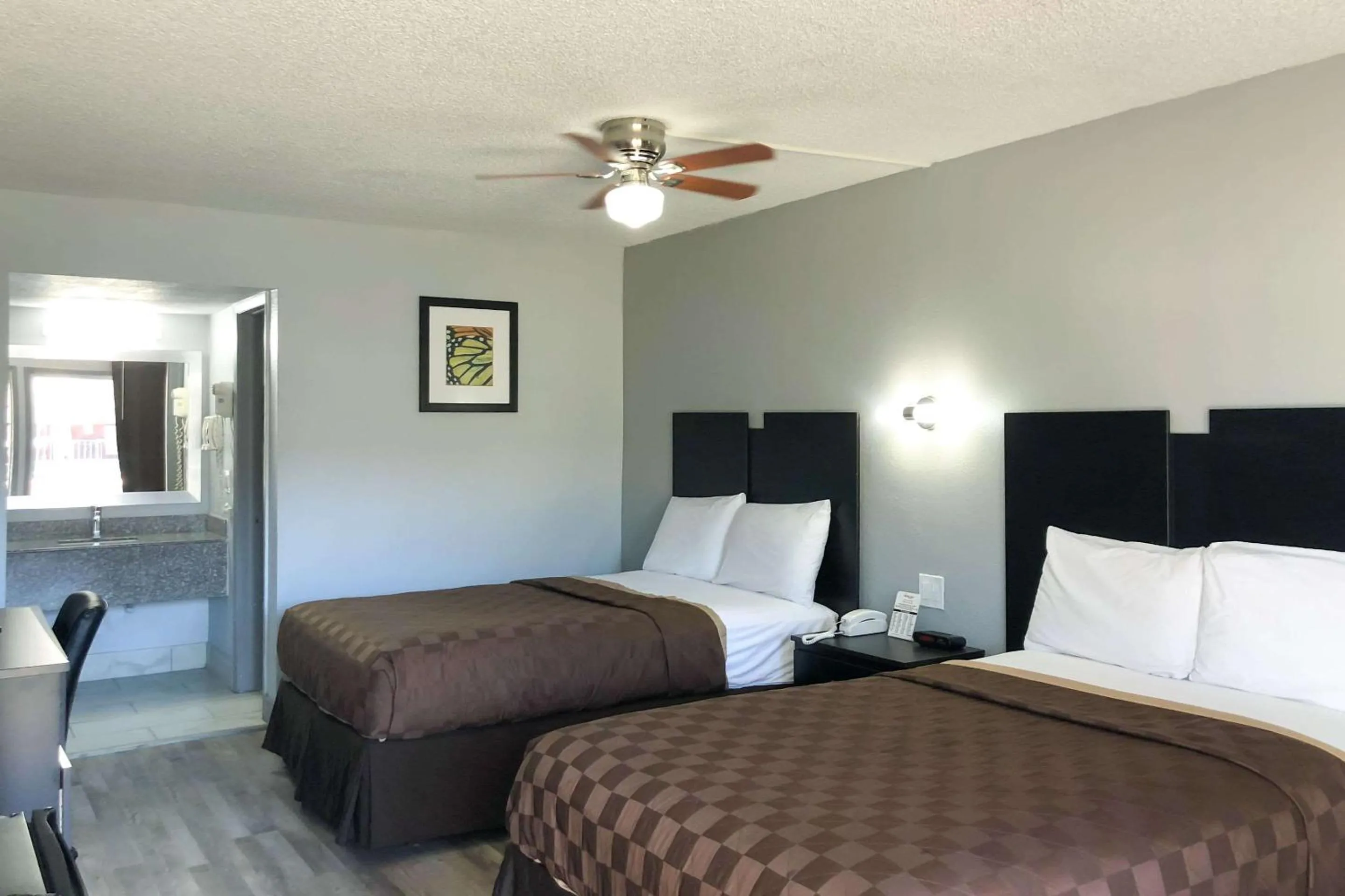 Bedroom, Bed in Rodeway Inn Sun City Center