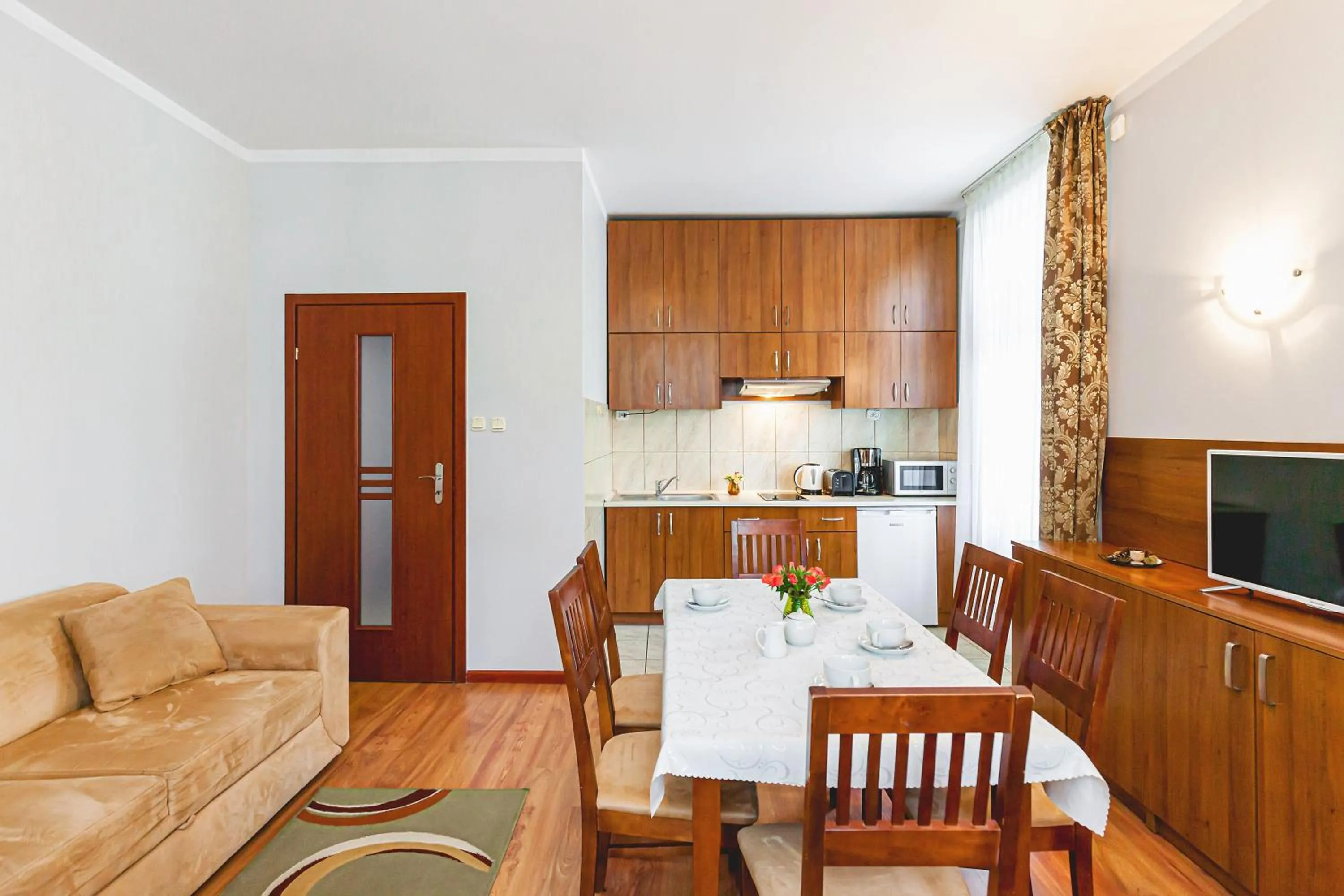 Kitchen or kitchenette in Apartament w willi Rybitwa