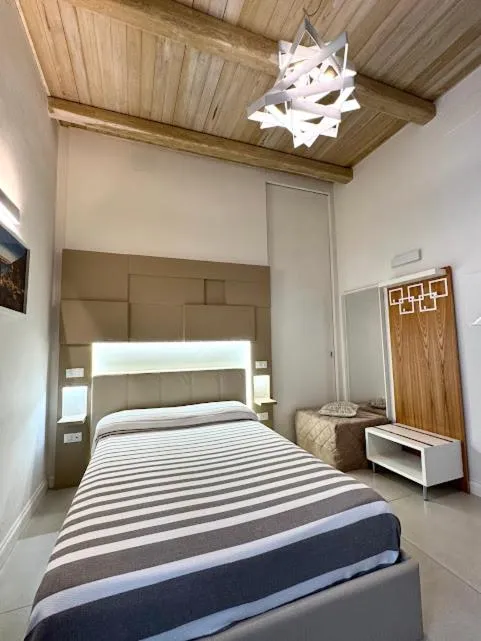 Bed in Le Suite del Duomo