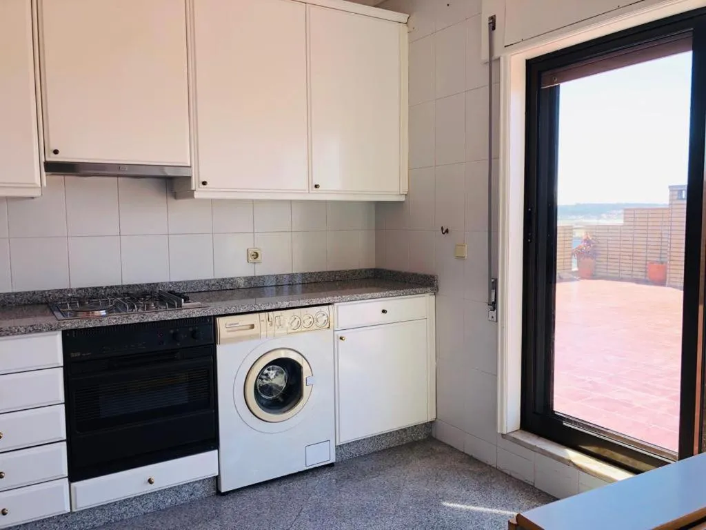 Kitchen or kitchenette in Apartamento Ruy Belo - Foz