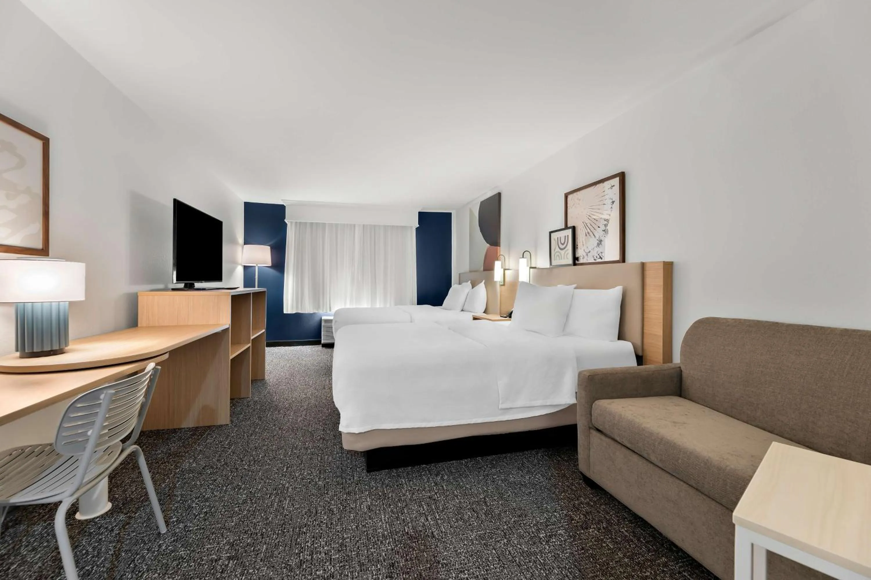 Living room, Bed in Wingate by Wyndham Tupelo