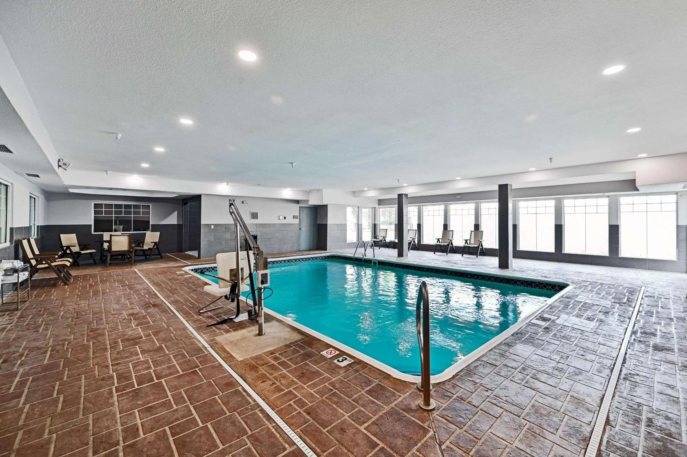 Swimming pool in Country Inn & Suites by Radisson, Bloomington-Normal Airport, IL