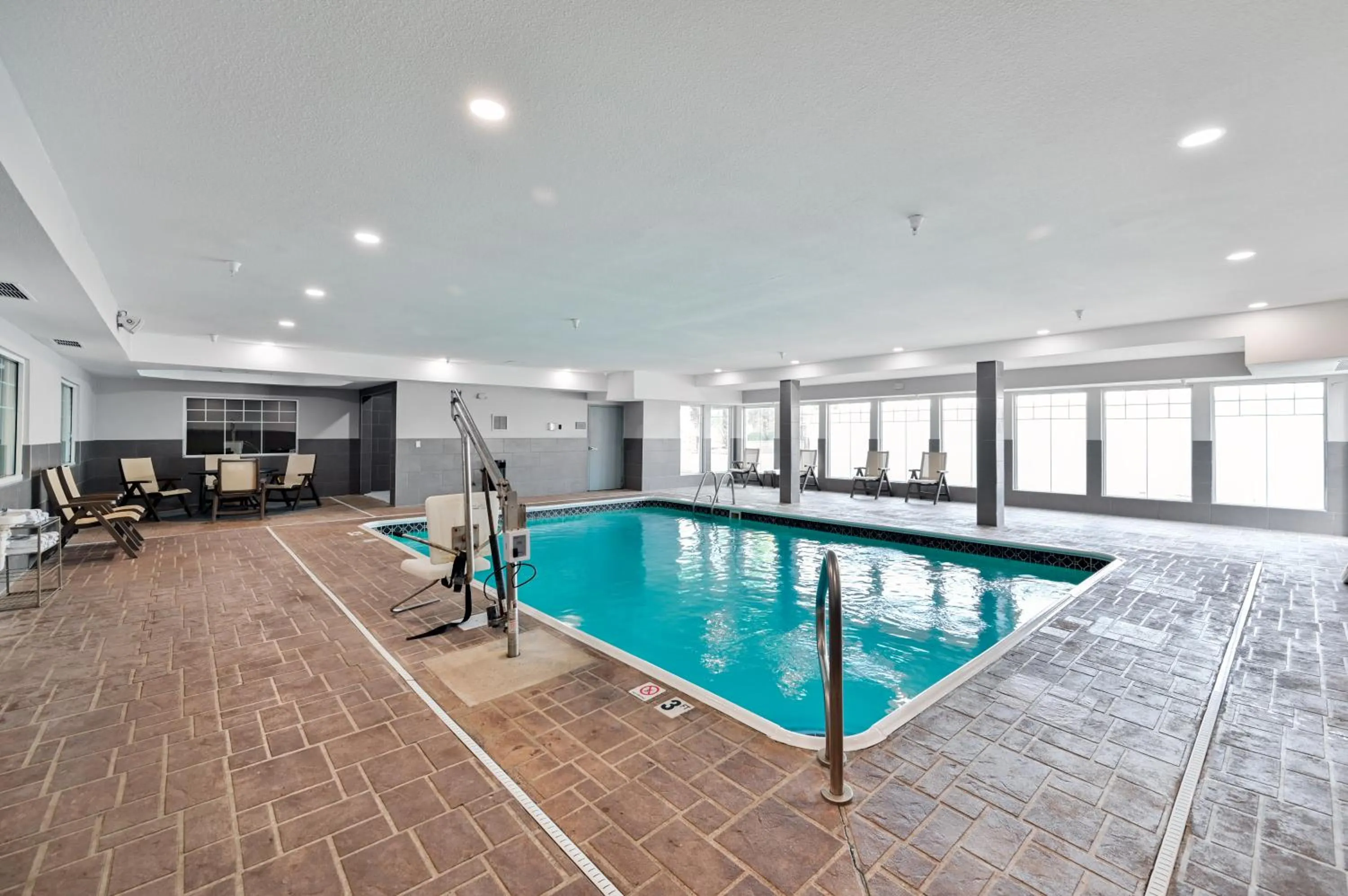 Swimming pool in Country Inn & Suites by Radisson, Bloomington-Normal Airport, IL