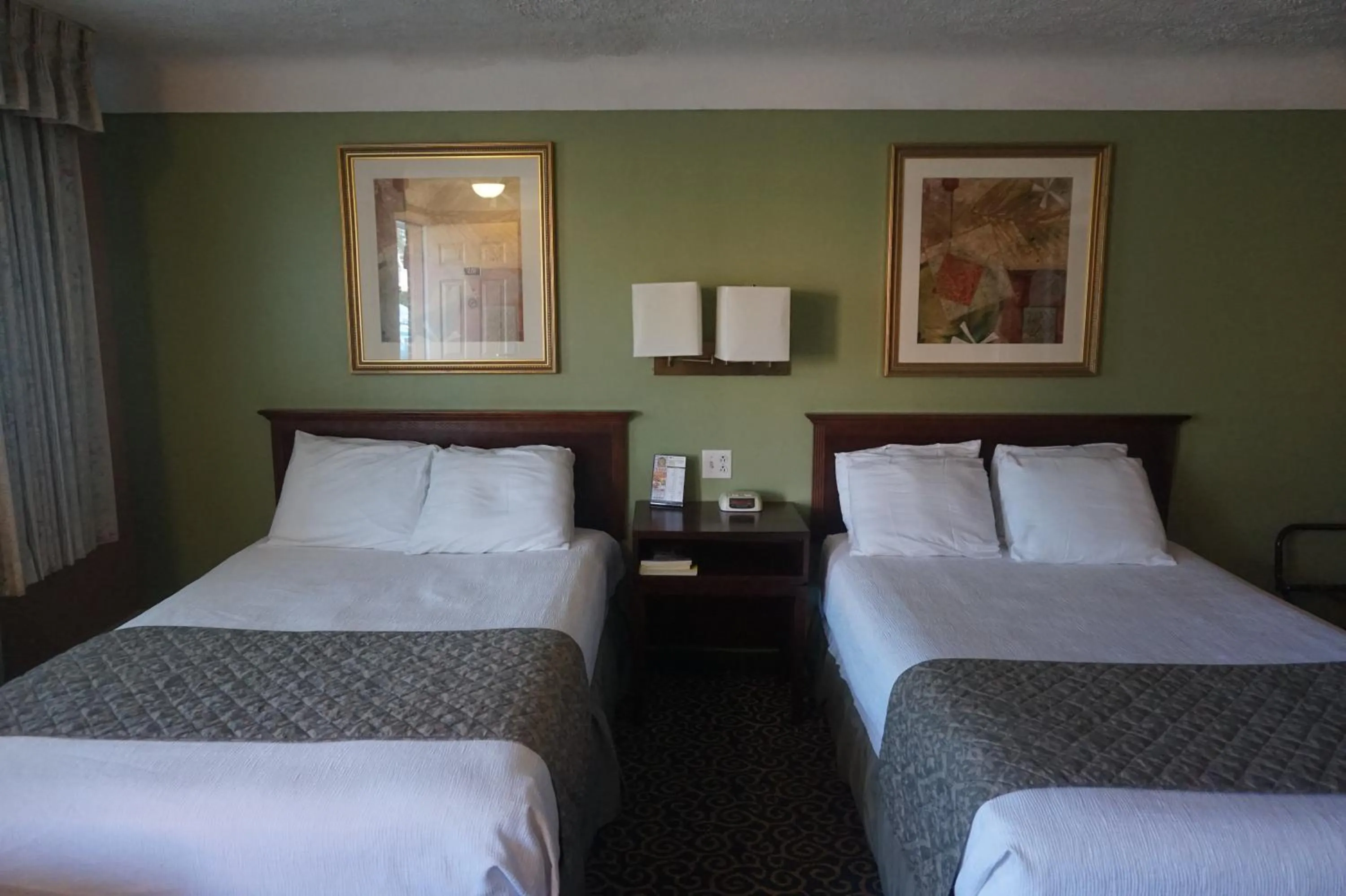 Bed in Bellevue Hotel and Suites