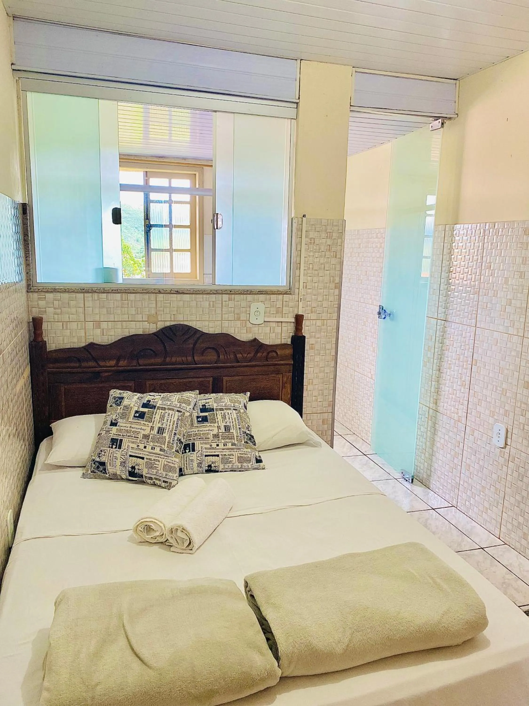 Photo of the whole room, Bed in Hospedaria Vila Rica - Pousada a 1 km do Centro Histórico