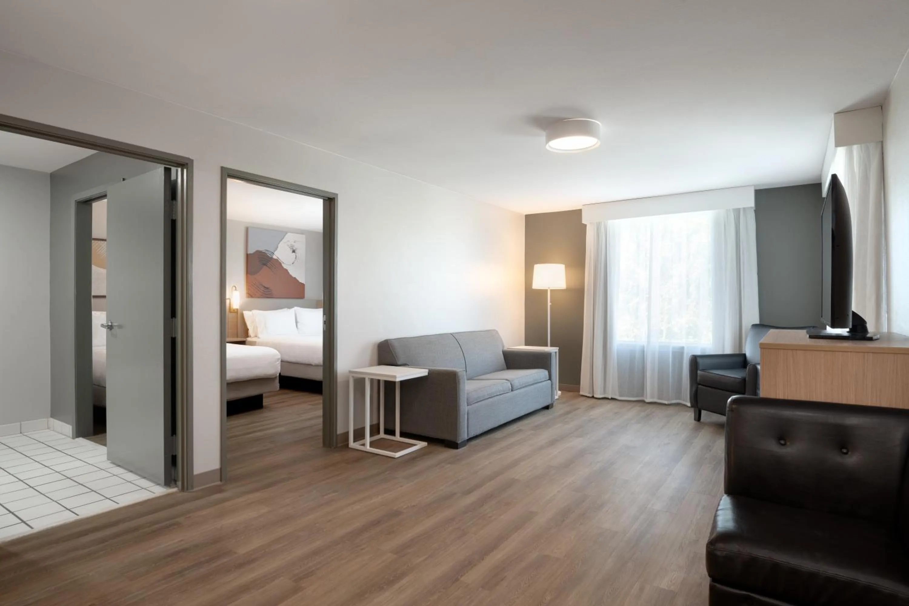 Living room, Bed in Best Western Sugar Sands Inn & Suites