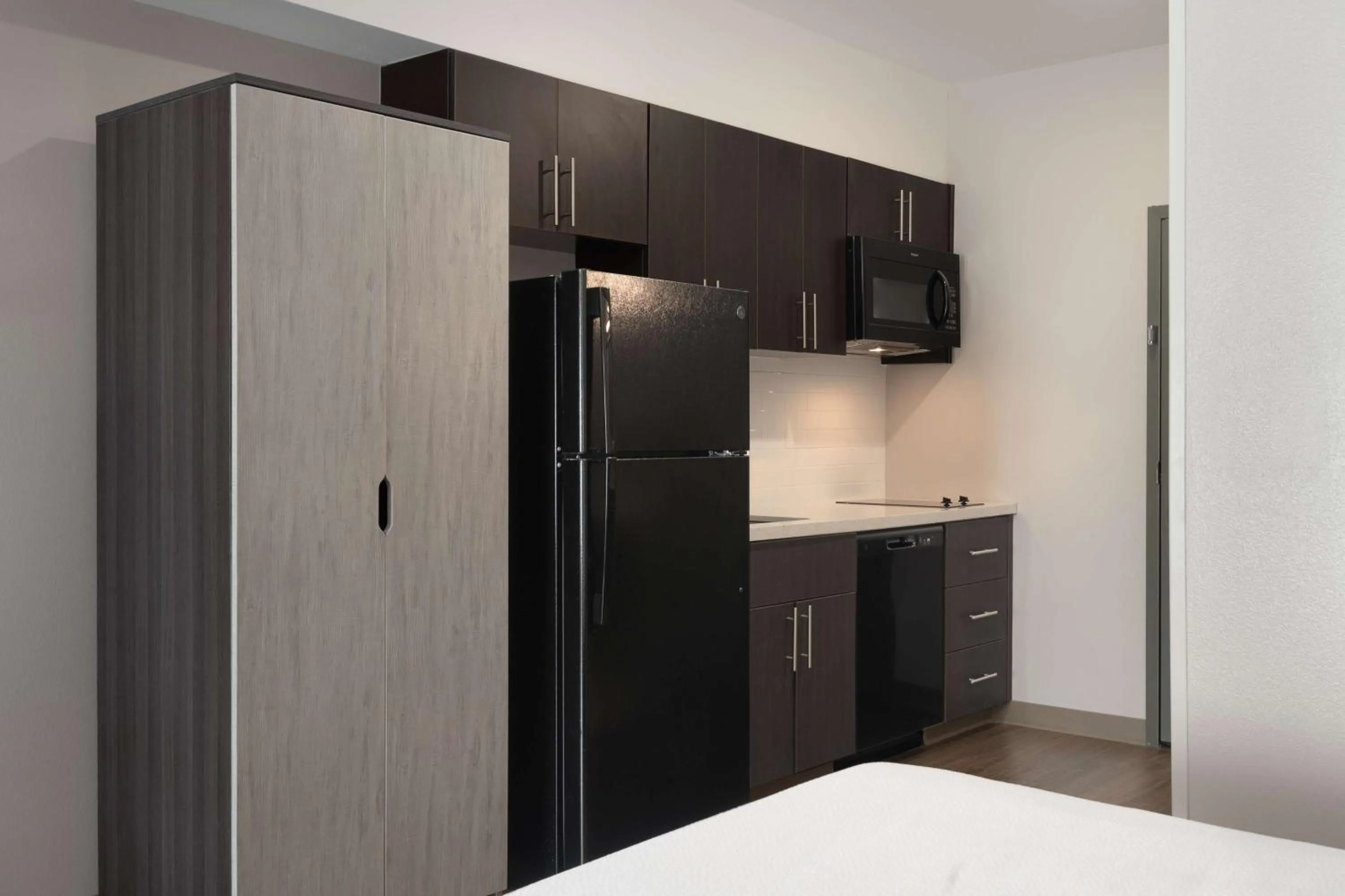 Kitchen or kitchenette, Bed in Spark by Hilton Destin