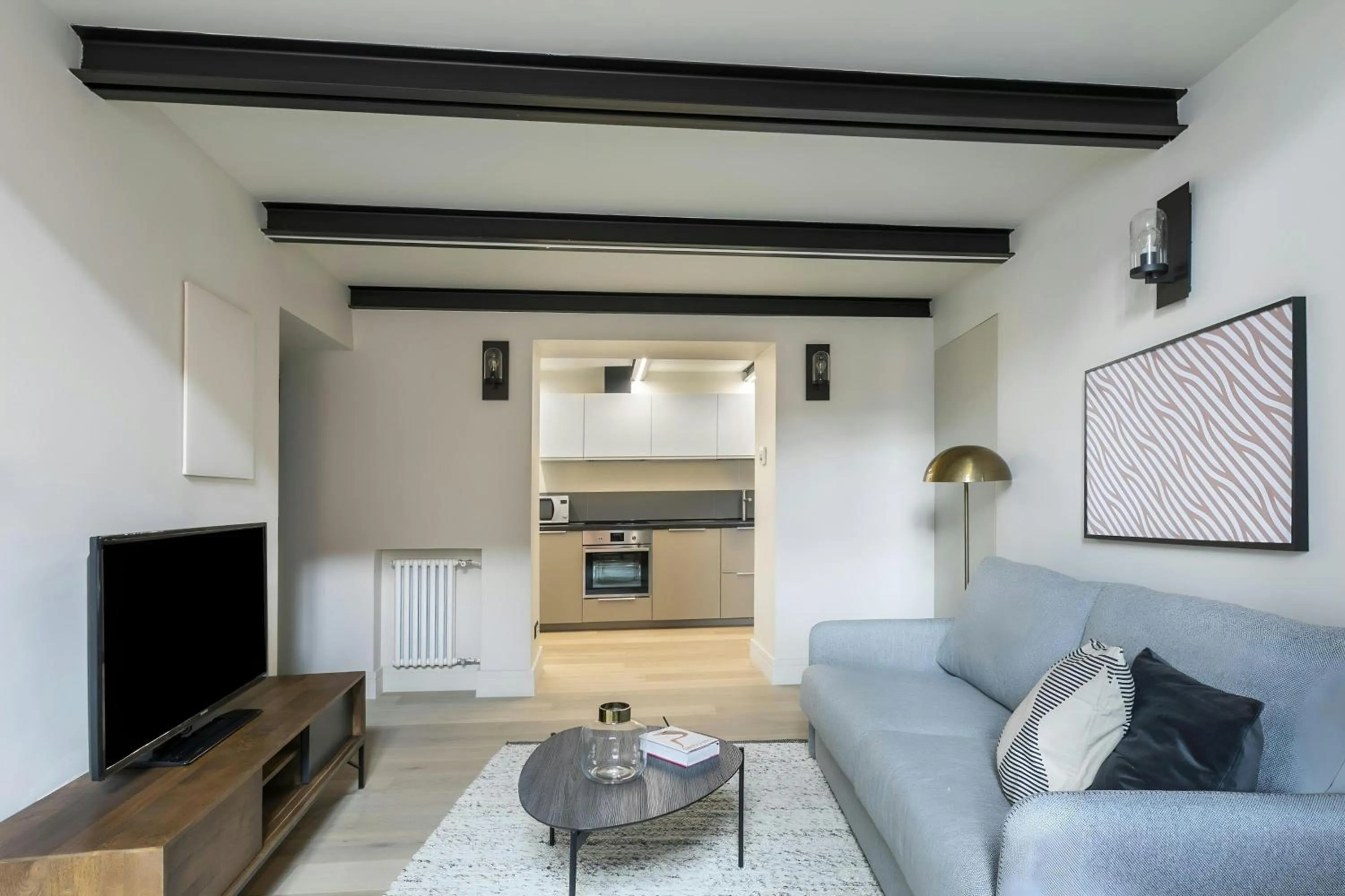 Living room in Sonder by Marriott Bonvoy Trastevere Apartments Piazza Trilussa