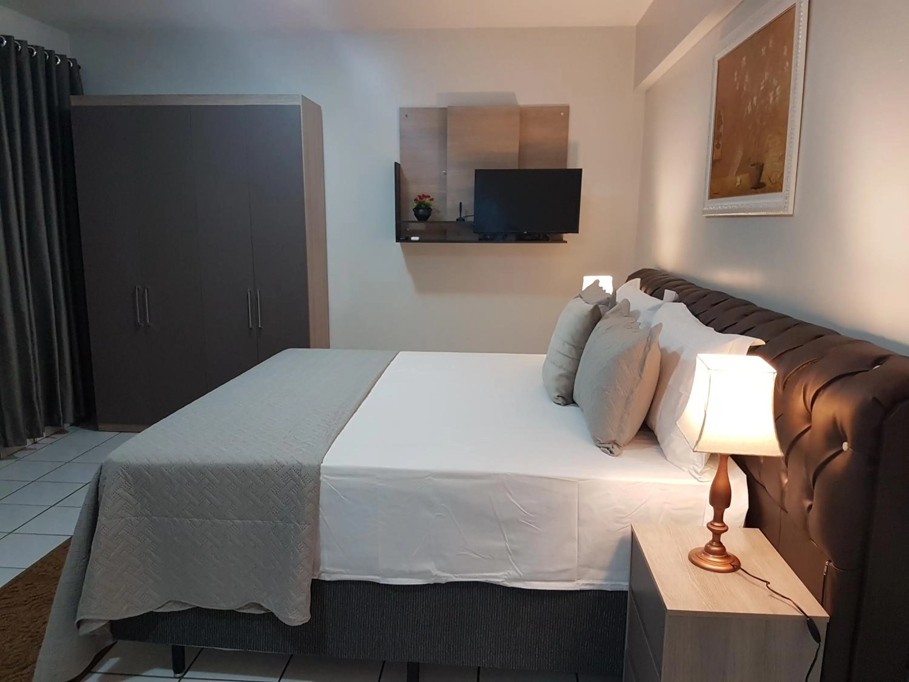 Bed in B & A Suites Inn Hotel - Quarto Luxo Diamond