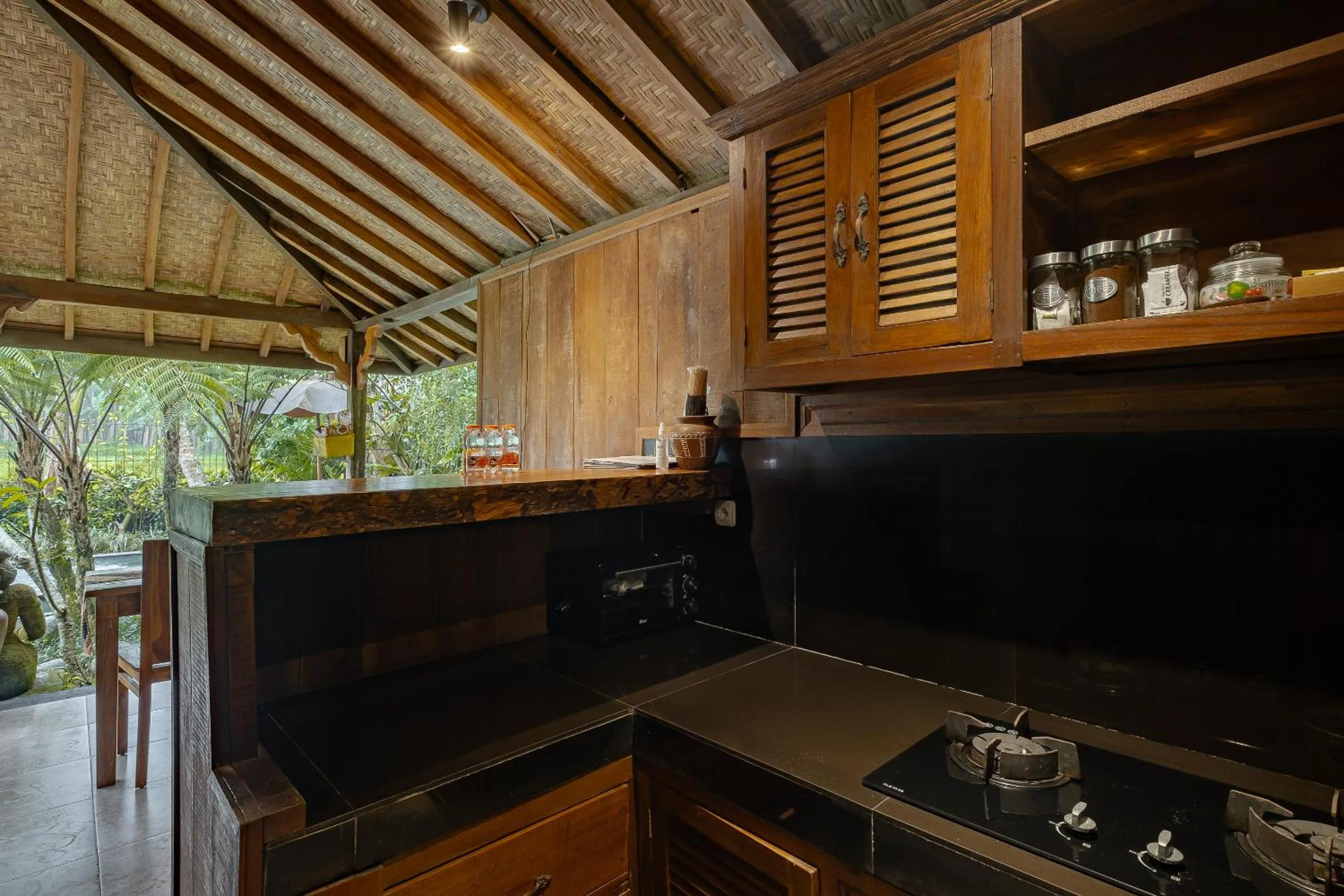 Kitchen or kitchenette in Moringa Ubud Villa