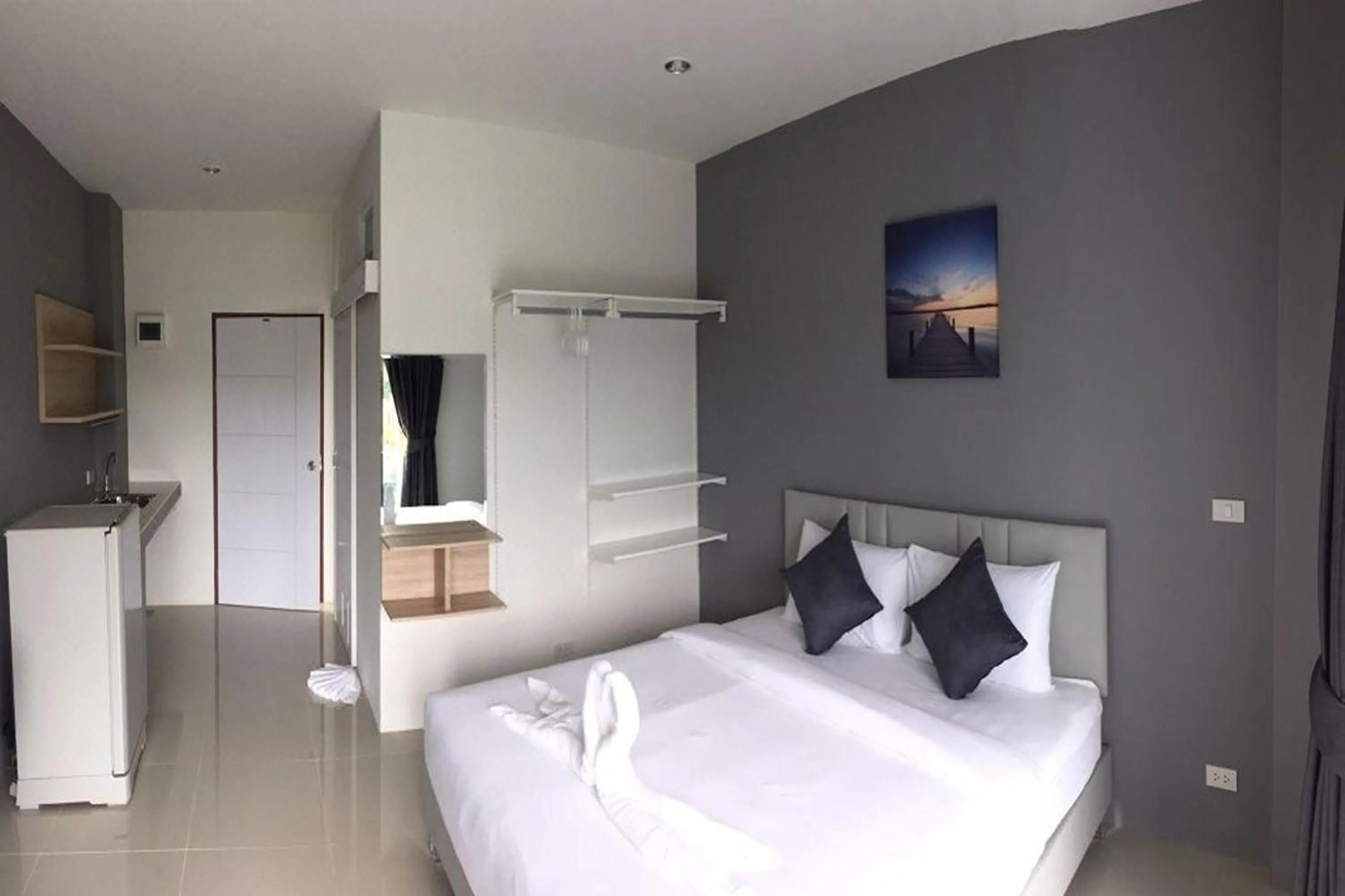 Bed in Big Buddha Hillside Hotel